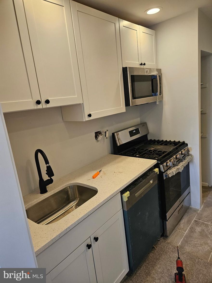 NEWLY RENOVATED 2 Bedroom Condo in convenient location near US Census and Suitland Metro.  This contemporary condo has modern tile floors and brand new plush carpet.  Large separate living and dining rooms with spacious balcony provide space for large furniture.  Large bedrooms with plenty of closet space and built in lighting.  Brand New Kitchen with appliances, cabinets and countertops. Renovated bathroom will make this home cozy and luxurious.  Ready to move in immediately.  Plenty of parking in fenced in community. Close proximity to public transport and US Census Bureau.