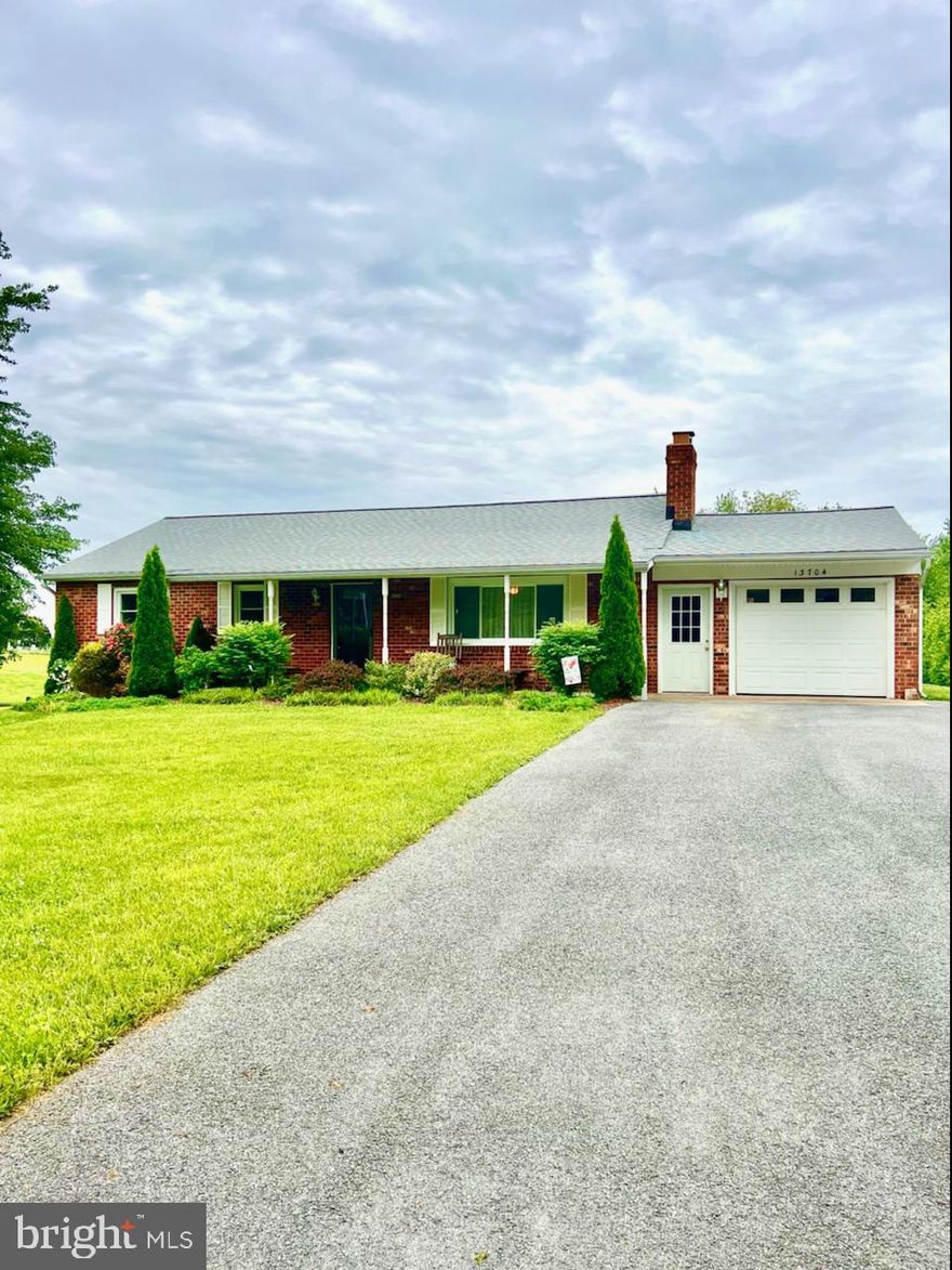 Stunning Rancher in Mt. Airy!  This place has everything to live the easy life!  There is plenty of open backyard to host an outdoor BBQ or start a garden right before the heat of summer gets here. Beautiful wood laminated flooring are spread throughout the main floor of the home.  The kitchen is tastefully updated with 42 in cabinets,  granite countertop and stainless appliances.  A spacious covered patio is located of the dining room, overlooking the well manicured lawn.  The living room  is highlighted by a wood burning fireplace.  Three bedrooms and 2 bathrooms are located on the main floor. The walk out lower level includes a fourth bedroom, a wet bar, a full bathroom, laundry room and  a large storage area. . In the back is a spacious utility room and access to the backyard.  Additionally, this home has a large one car garage.
Roof is BRAND NEW!
Windows have been replaced
Kitchen and Baths have been update
Dual heating systems - Oil furnace and heat pump