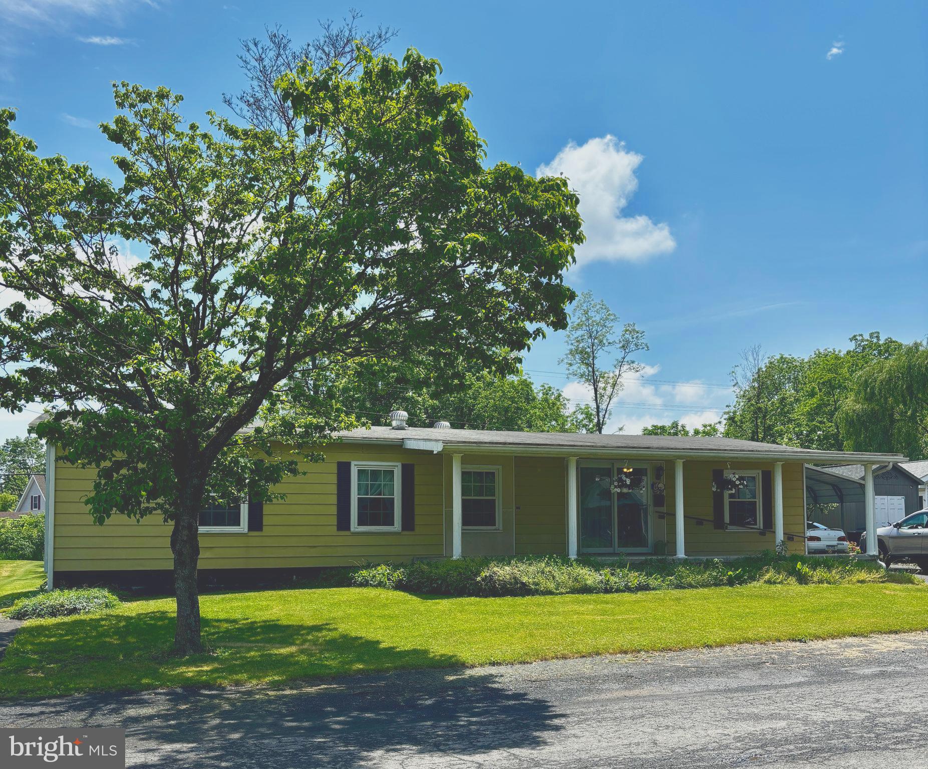 **Handicap Accessible and Spacious Double-Wide on Foundation in a quiet Milroy Neighborhood with a 1-Year Home Warranty**
Welcome to this well-maintained double-wide home, perfectly situated on a foundation in a rural neighborhood in Milroy. Enjoy peace of mind and extra space with a fenced, expansive backyard—ideal for children and pets. Two utility sheds offer ample storage, and off-street parking adds everyday convenience.
Inside, recent upgrades enhance comfort and style, including Pella tilt-in replacement windows and luxury vinyl plank flooring in the kitchen and dining areas. The efficient HVAC system, installed just 5 years ago, along with a whole-house dehumidifier, ensures year-round comfort. There's even a newer pellet stove to save on heating costs on the main floor and electric baseboard heat in the basement.
The full basement extends your living space with a partially finished second kitchen, a generous family room, bonus room, and abundant storage throughout.
Unwind in the screened-in rear porch, which offers scenic views and the potential to be converted into an all-season room—perfect for relaxing no matter the weather.
Don't miss this spacious, move-in ready home with room to grow, inside and out!
