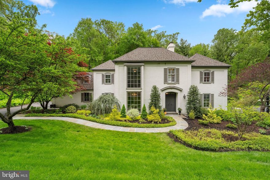 Move right into this French Colonial in Wayne's "The Woods" neighborhood! The current owners have updated and renovated this beautiful home inside and out. The Roof, HVAC, & Central Air have been replaced. A Whole House Generator has been added. The Kitchen, Primary Bathroom & Hall Bathroom have undergone a full renovation & the partially finished Basement has been updated as well. The Main Level has a wide welcoming Center Hall with Double Door entrance and open staircase, expansive Living Room with gas fireplace, sunny Dining Room with custom woodwork, bright updated Kitchen with granite/quartzite countertops & stainless appliances, Laundry/Mud Room, garage entry, and a showstopping two-story Family Room with a breathtaking two-story window, beamed ceiling, and wood burning fireplace. The second floor has a wonderful Primary Suite with abundant light, a completely redesigned Closet System/Dressing area and a renovated Primary Bath. Down the hall, there is a unique Office Area with custom built-in shelving and desk area that overlooks the two-story Family Room. Continue on this floor and you'll find a completely updated spacious Hall Bathroom and Two Additional Bedrooms that overlook both the front and back yard. At the end of the hallway a Large Bedroom  with plenty of closet space and charming deep window sills completes the second floor. The partially finished basement offers more places to play and lounge. In addition to the large finished area, the Basement offers additional closet space, storage, and utility access. The exterior of the home is gracious and inviting with professional landscaping, beautiful flowering trees and flower beds with irrigation system. The private bucolic backyard can be enjoyed on the large flagstone patio that accesses the Kitchen as well as the Family Room through updated sliding doors-creating wonderful indoor/outdoor flow for entertaining and everyday life.  Ultra convenient location-just minutes from major highways, retail, restaurants, public transportation.  RADNOR SCHOOLS!