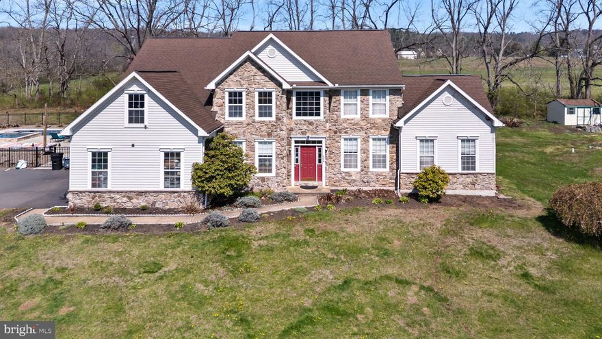 OPEN HOUSE Wednesday, May 6th 5pm-7pm!  Welcome to your private, resort-style retreat in the Governor Mifflin School District, perfectly designed for anyone who loves to entertain, relax and create unforgettable memories at home.
Nestled on nearly 5 acres in a quiet cul-de-sac community, this stunning Greth-built home offers the rare combination of space, privacy and luxury living.  From the moment you arrive, you’ll feel like you’ve stepped into your own personal getaway.  Inside, the home opens into an expansive thoughtfully designed layout built for both everyday living and hosting. The impressive 30’ x 16’ living room is far more than a simple bump-out, it’s a true gathering space filled with natural light and generous space.  A separate 20’ x 16’ family room with a gas fireplace and stone surround creates the perfect cozy retreat for movie nights and holidays.  The heart of the home is the open-flowing kitchen, sunroom, and living areas, designed to keep everyone connected. The kitchen features quartz countertops, a walk-in pantry and an eat-in bar ideal for casual meals or entertaining. Just beyond, the bright sunroom provides the perfect space for morning coffee or relaxing while overlooking your private backyard.  Upstairs, the home continues to impress with a spacious primary suite, a princess suite with private bath and additional bedrooms.  A new second-floor AC and furnace system ensures year-round comfort and efficiency.
The finished lower level offers over 1,500 square feet of additional living space.  Complete with a full bath, two large additional rooms, a bonus living area with projector setup and walk-out access via Bilco doors, this level is perfect for a home theater, playroom, gym or guest retreat.  Step outside and this is where the lifestyle truly comes to life.  Your backyard is a private resort designed for both everyday living and unforgettable entertaining:  A stunning saltwater, heated 20’ x 40’ Gunite pool with color-changing lighting. A massive 10’ x 10’ jetted spa with seating for 15 for relaxing evenings.  A beautifully designed deck featuring a swing daybed, perfect for unwinding while overlooking the property.  A fully equipped outdoor kitchen with a 10-foot stainless steel bar, commercial-grade grill, fryer, sink, hot water and dedicated propane hookups. The 1000 gallon propane tank is owned free and clear.  A cozy firepit sitting area ideal for evenings under the stars.  Over $10,000 in lush landscaping with plants and river rock, creating a serene, vacation-like setting.  A pool house, basketball court, extended driveway and expansive open space offering privacy .  Whether you're hosting summer pool parties, enjoying peaceful evenings outdoors or simply creating a lifestyle where your home feels like a vacation, this property delivers space, comfort and resort-style living in every season. This is more than a home, it’s a place to build lasting memories.  A truly rare opportunity to own a one-of-a-kind property that blends luxury, functionality, and an unbeatable indoor-outdoor lifestyle.