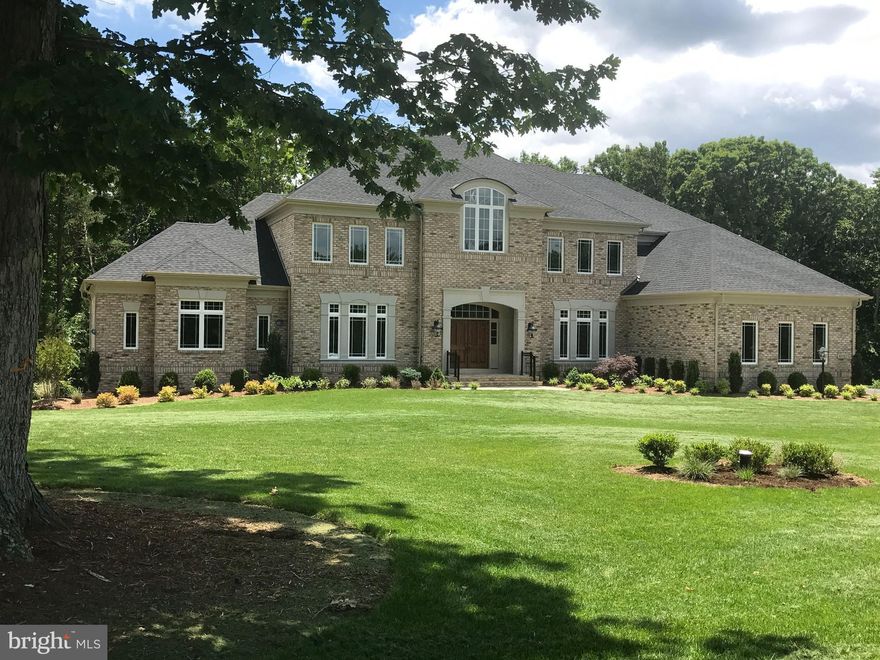 Customized Winthrop Model 7000 SQ. FT on 2 levels, on   7 acres. 4 bedrooms and 4.5 bath. 2 master suites- one on the main level and one on the upper level, 2 family rooms, formal living room and formal dining room. Very sophisticated  custom touches throughout the house.