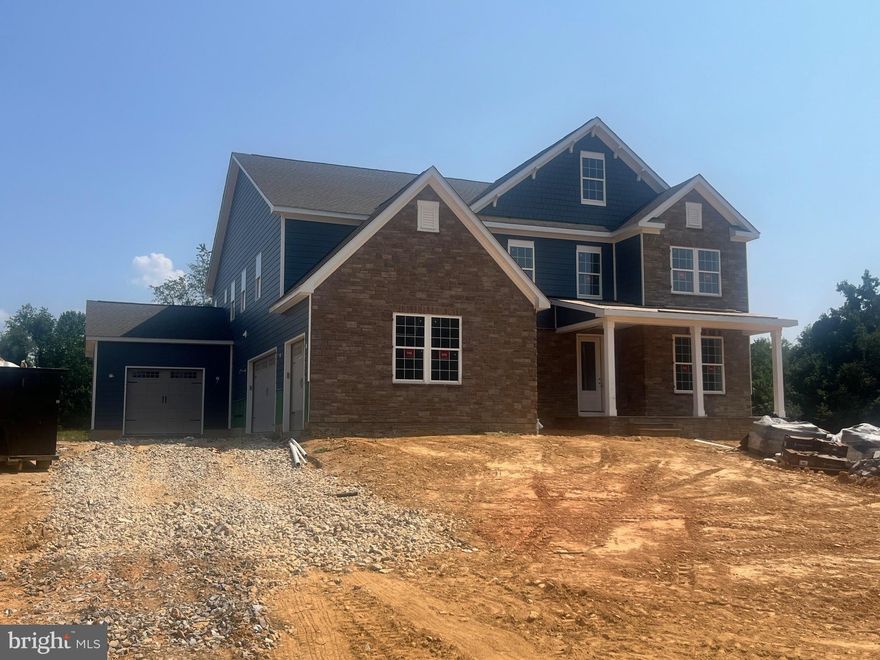 **September Move in available!!** Country meets luxury living on this sprawling 1.5 acre ultra private homesite, with just over 4,600 sqft above grade, complete with a finished basement, bedroom and full bathroom on main level and 4 car garage. The Hampton features an extensive grand 2-story foyer, formal dining room, tray ceilings, and fireplace. The chef's kitchen includes a double oven, stainless steel appliances and walk-in pantry. Basement includes a finished rec room, bedroom and full bathroom. Price listed is for finished home, upgrades already included. *Photos not of actual home, and are of a similar model*