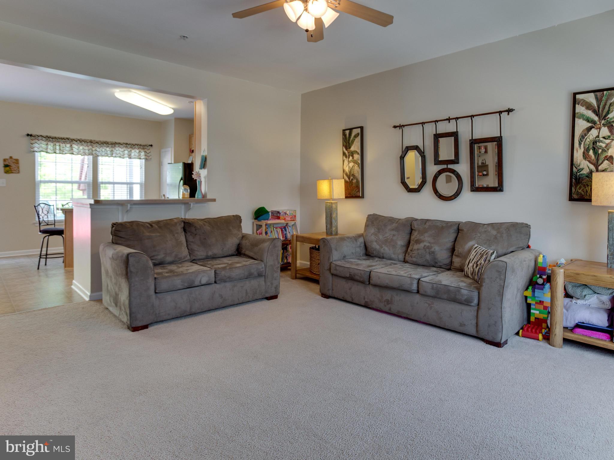 Plenty of Room for everyone in this sought after community. This townhome is meant to enjoy the inside as well as the outside and don't forget the community. Large open space with natural light inside. Enjoy the eat in kitchen that connects to an oversized large deck outside, and a quick walk will take you to the well known railroad trail on fishing creek. Run, walk, and simply enjoy the outdoors.