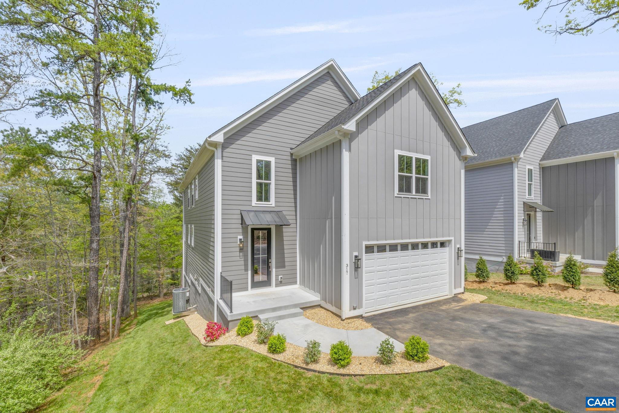 Location, Privacy and Space are some of the highlights of this nearly-new home. Completed in 2023 the home was rented for only one year. The home sits just outside the city limits and is currently zoned for Western Albemarle schools. The walkout basement is prepared for the potential for a separate living space (see plans and deed restrictions for more information). No HOA. This is walkable to the university, especially Fontaine Research Park. The home backs to the railroad and is surround by trees and critical slopes that provide a great private rear buffer. No carpet, the house is all luxury vinyl plank flooring with granite counters, soft close cabinets, wood shelving and much more.,Granite Counter,Wood Cabinets