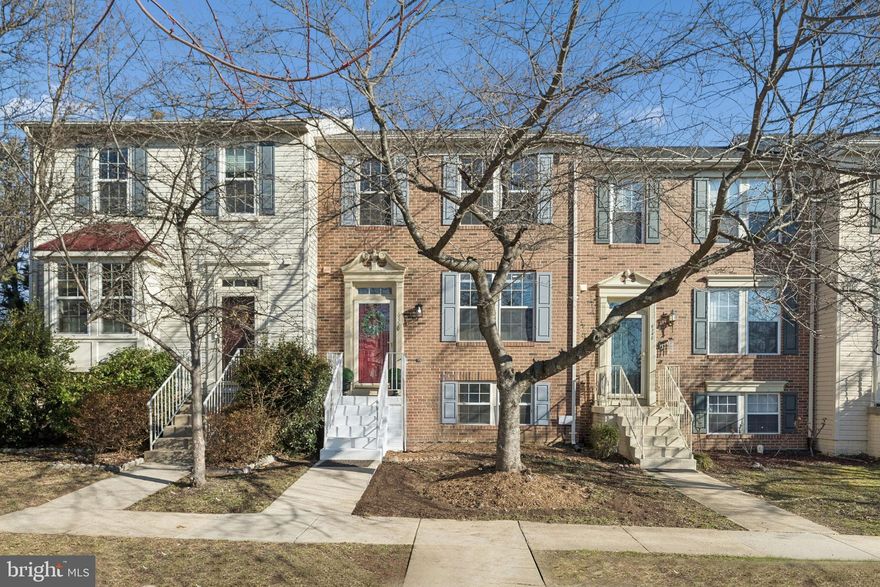 Welcome home! This bright and airy brick front townhome offers three spacious levels of updated living. Gleaming hardwood floors flow through the open living and dining areas, while newly installed ceramic tile highlights the kitchen. Large windows flood the home with natural light, and the family room features modern recessed lighting for a warm, sophisticated feel. The updated kitchen includes stainless steel appliances and easy access from the dining area. Upstairs, all bathrooms have been recently renovated. The spacious primary suite boasts vaulted ceilings and an updated en suite bath with a step-in shower, wide vanity, and a walk-in closet. Two additional bedrooms are generously sized. The fully finished lower level offers a versatile recreation room, a full bath, and a full bedroom—ideal for a home office or in-law suite. Enjoy a larger fenced backyard with added privacy and shade. Major updates include a new HVAC (2024) and water heater. Community amenities feature an outdoor pool, tennis and basketball courts, plus two reserved parking spaces. Schedule your private tour today!