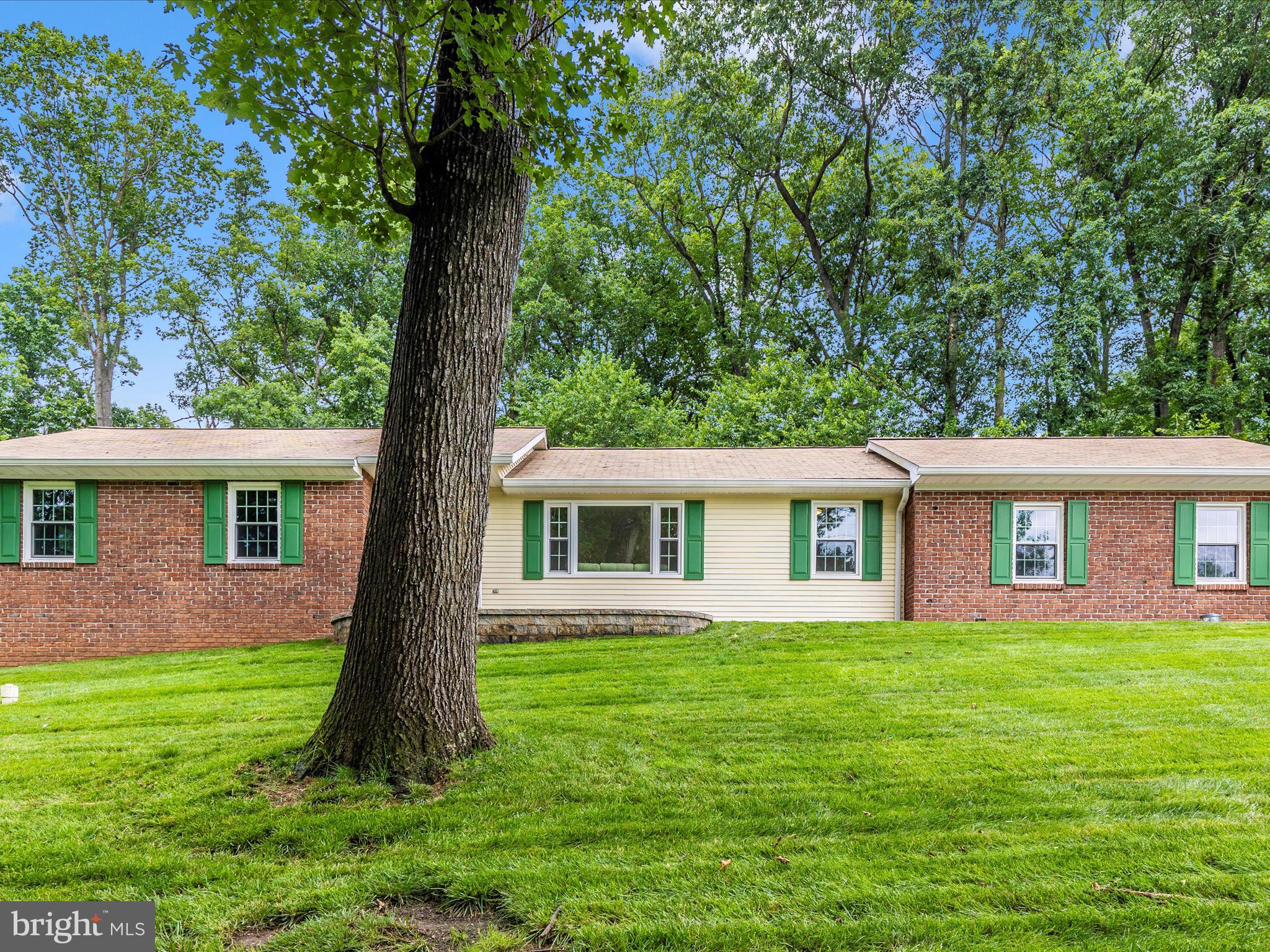 Single-Level Living at Its Finest in Prime Westminster Location!
Discover the ease and comfort of one-level living in this beautifully updated rancher, ideally situated on a picturesque 1.06-acre fenced lot—perfect for pets, play, and peaceful outdoor living. This move-in ready home combines thoughtful updates, functional space, and timeless charm to meet all the needs on your homebuying checklist.
From the moment you arrive, you'll be welcomed by a charming walkway leading to the inviting covered front porch. Step inside to find brand new luxury vinyl plank (LVP) flooring flowing seamlessly throughout the main living areas, setting the tone for the home's clean, modern style.
The spacious living room features a large picture window with tranquil views of the farmland across the street, and opens to the formal dining room—currently styled as a home office. Continue into the heart of the home where the kitchen, dining area, and cozy brick-accent wall create a warm and open space ideal for everyday living and entertaining. The kitchen features rich maple cabinetry, granite countertops, tile backsplash, black appliances, a built-in peninsula, and a pantry—perfect for casual dining or your morning coffee.
Just off the kitchen, the laundry and mudroom with garage access make daily routines easy and organized.
The bedroom wing offers three generously sized rooms, including a serene primary suite with space for a king-size bed and a recently renovated spa-like en-suite bathroom with tiled walk-in shower. Two additional bedrooms share an updated full hall bath, also beautifully remodeled.
Downstairs, the expansive finished basement provides endless possibilities: media room, home gym, game room, or hobby space—plus a bonus room ideal for guests or a creative workspace. A large unfinished area offers additional storage or potential workshop space.
Step outside to enjoy your private backyard retreat, featuring a screened-in porch for relaxed outdoor dining, a fully fenced yard for pets and play, and plenty of room for gardening or enjoying the natural surroundings.
Additional highlights include a spacious 2-car garage with built-in shelving, ample driveway parking, and a long list of recent upgrades:
Recent Updates Include:
2025 – New LVP flooring on main level, new water heater
2023 – Renovated primary and hall bathrooms, replaced main level windows
2022 – New water pressure tank, water treatment system
2021 – New HVAC system
2020 – New carpet in bedrooms
2019 – New roof with ridge vent, added attic insulation
This rare find offers the perfect blend of space, style, and convenience in a sought-after Westminster location. Don’t miss your opportunity—schedule your private tour today!