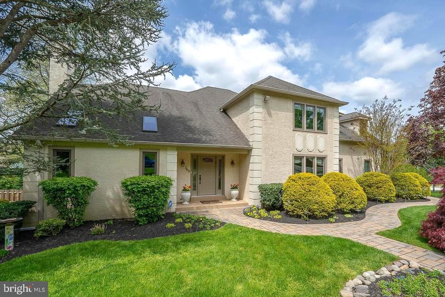 This impeccably-maintained, corner property is located on a quiet cul-de-sac in Main Line’s most sought after community, Indian Creek. This beautiful 5 Bedroom, 4.5 Bath home is in move-in condition top to bottom and will check every box on your list. With over 5,000 SF of living space, this home provides luxurious and quiet living for today’s modern family. Enjoy the magnificent, lush landscaping before entering into the 2-story Foyer with tile floor and an elegant turning staircase. The 2-story Living Room with hardwood floors is accented by a beautiful floor-to-ceiling rustic stone wall with gas-burning fireplace. Two skylights allow for an abundance of natural light to pour in. The adjoining office/den/library, with French doors, is an ideal space to work from home or simply enjoy a quiet place to read. The formal Dining Room, featuring hardwood floors, a large triple-pane window and French doors, is perfect for hosting dinner parties for family and friends. The gourmet Eat-In Kitchen boasts granite countertops, custom tile backsplash, center island and stainless steel appliances. The bisque cabinetry, skylights, expansive casement windows, spacious dining area and built-in desk make this a light and enjoyable space to dine and congregate. The adjoining laundry room, with main level washer/dryer and entrance to the expanded 2-car garage, with built-ins, add a level of convenience and purpose to this home’s layout. The spacious Family Room provides a comfortable space to gather with large sliding doors (new 2021) providing access to the wrap-around deck, perfect for entertaining year-round. A lovely Half-Bath completes the main floor.  Head upstairs to the Primary suite with an amazing Full Bath offering double vanity, double stall shower, skylight, and walk-in closet. Three additional large bedrooms with ample closet space and 2 Full Baths complete this level.  Head down to the lower level to find the 5th Bedroom with Full Bath, a large recreational area, custom wet bar, hardwood flooring, large storage area and direct walk out access to the private patio.  This property has been meticulously maintained, with new landscaping upgrades and walkway lighting, Stucco improvements (2021), New Central Air (2021) and Newer windows throughout (2018), just to name a few.  Located in the coveted Lower Merion school district and perfectly distanced to Center City, PHL Airport, King of Prussia business districts, University City and amazing Main Line restaurants and shopping. This unique and peaceful, sidewalk community offers a true neighborhood experience and a tranquil place to retreat from the fast pace of everyday life. Come see your new home today!