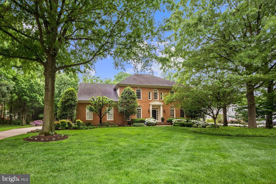 $125k worth of renovations! 4BR + DEN/5BA. Approx 5,400sqft & lots of light. New BAs, designer lighting & custom trim! Fantastic floorplan-KIT open to Fam Rm. DR w/butlers pantry; LR & LIB both w/custom built-ins. Lux master suite! Beautiful outdoor space w/flagstone patio, mature landscaping + flat lawn. Walk-out LL w/ Rec rm, Billiards, DEN + 5th BA, tons of storage.  Fab mudroom off garage!