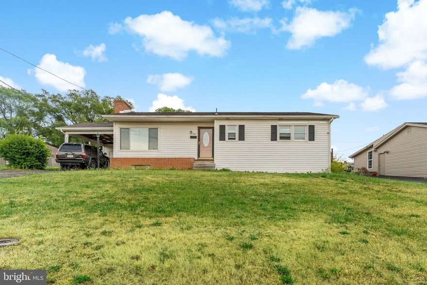 Great starter home or investment property! Are you looking for something that you can make your own at an affordable price? Look no further! This cozy home offers a spacious living room that opens up into the eat-in kitchen. No carpet throughout with hardwood floors in the living areas and bedrooms. The main bathroom has been upgraded with a new vanity and tile flooring. Outside, the long driveway with the attached carport offers plenty of parking space. Grill and chill out back under the covered back patio, and enjoy the spacious back yard. The right repairs/upgrades with some TLC will make this a great home! **PROPERTY SOLD AS-IS. The sellers have disclosed possible mold/evidence of moisture in the basement. **MULTIPLE OFFERS RECEIVED AS OF WEDNESDAY 6/14. THE DEADLINE FOR FINAL OFFERS IS FRIDAY 6/16 AT 5PM.