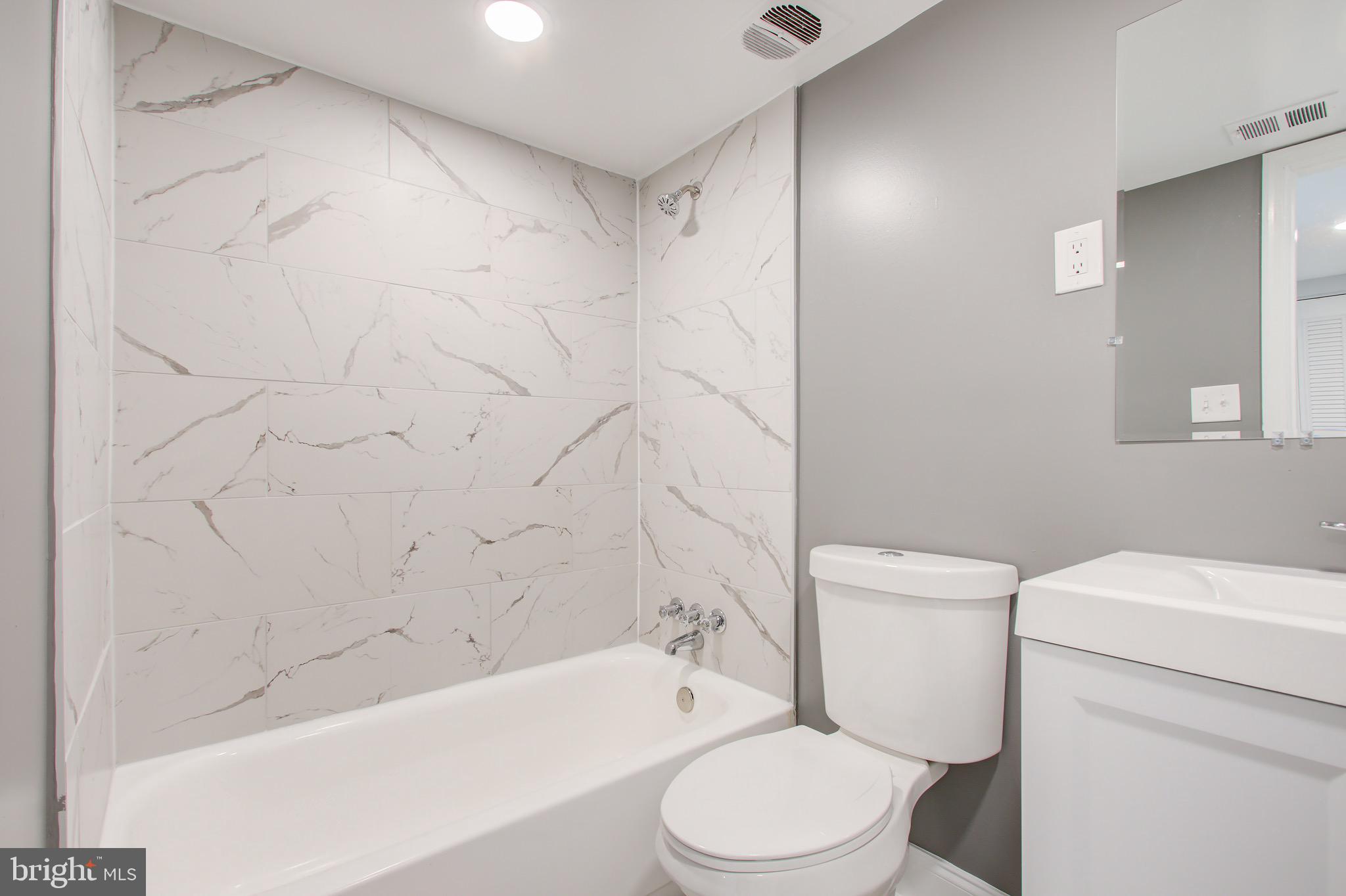 Beautiful Renovated Walk to Metro 1 Bed / 1 Bath Condominium on the Patio Level with ALL utilities included in your condo fee. Brand New Bathroom Top to Bottom. Brand New Recessed Lighting Throughout the Unit. Renovated Kitchen includes brand New Lighting, Cabinets, Matching GE Above Range Stainless Steel Microwave, GE Stainless Steel Gas Stove , and GE Stainless Steel Refrigerator. Newly Painted Throughout the unit. Huge Walk out Patio.Secured Building with Large Laundry room and Climate Controlled Storage on the same level. The unit is just a few steps away from the Glenmont Metro on the Red Line. Short drive to the ICC , 495, and 270. Shopping Center and restaurants are also within walking distance. John F. Kennedy High School District