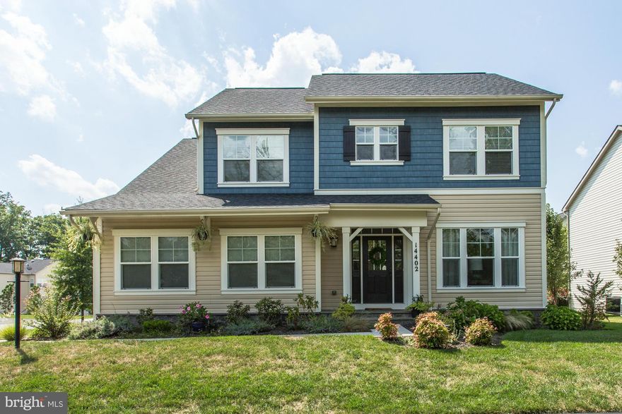 Stunning Craftsman Home in sought after Saranac. This home shows like a model! Immaculately maintained with gourmet Kitchen, Hardwood floors throughout Main level,Two story Foyer. Decorator touches  include granite counters, upgraded tile, Gorgeous moldings, Plantation shutters, custom paint , custom shelving.  Upgraded HVAC, Ext. Sprinkler System. Lake  Manassas! Must See!  Gorgeous Setting.