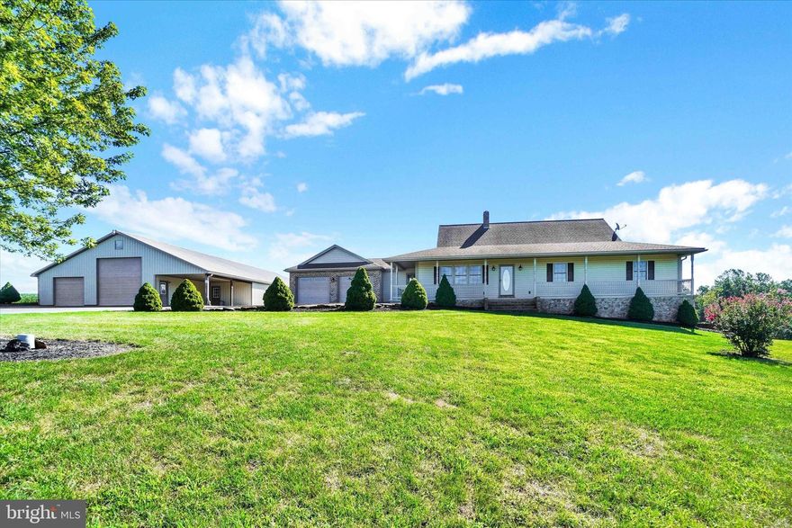 MUST SEE. Home built in 2005, This 5 BR  3.5 Bath home sits on 2 acres, surrounded by farmland and woods.    
Basement has it's own entrance with a garage, Basement could be for inlaw quarters with kitchen.
50 X 100 Pole Building with the sides insulated, RV connections, 25 X 13 Office and 24 X 14 Car Port, and 1/2 Bath in Office. Shed has 2-200 AMP Services, one for home, one for pole building. Home has a lot to offer. Super rare and expensive hand hewn hickory floors. High grade Keener's cabinets throughout with granite. A solar heated  10,000 gallon saltwater Fox pool. Outside RV connection also.  Please schedule your showing today