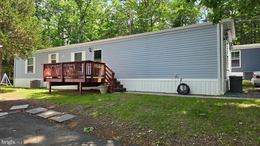 Nestled in the charming Holiday Mobile Estates, this exquisite 2021 Clayton manufactured home offers a perfect blend of modern luxury and comfortable living. With a spacious layout of 3 bedrooms and 2 full bathrooms, this single-wide home is designed to cater to your every need, providing an inviting atmosphere that feels just like home. The heart of the home is undoubtedly the kitchen where cooking and entertaining flow with delight. Natural light floods the living spaces through energy-efficient windows. This home is not just a place to live; it's a sanctuary where you can unwind and create lasting memories. Whether you're entertaining friends or enjoying a quiet evening at home, this property offers everything you need for a fulfilling lifestyle. Don't miss the opportunity to make this exceptional residence your own. Incoming buyer will need to be approved by Holiday Estates through interview process and background and credit check there is a $25 application fee. Pets are welcomes just NO DOGS, NO WORKING ON CARS, NO WASHING CARS.