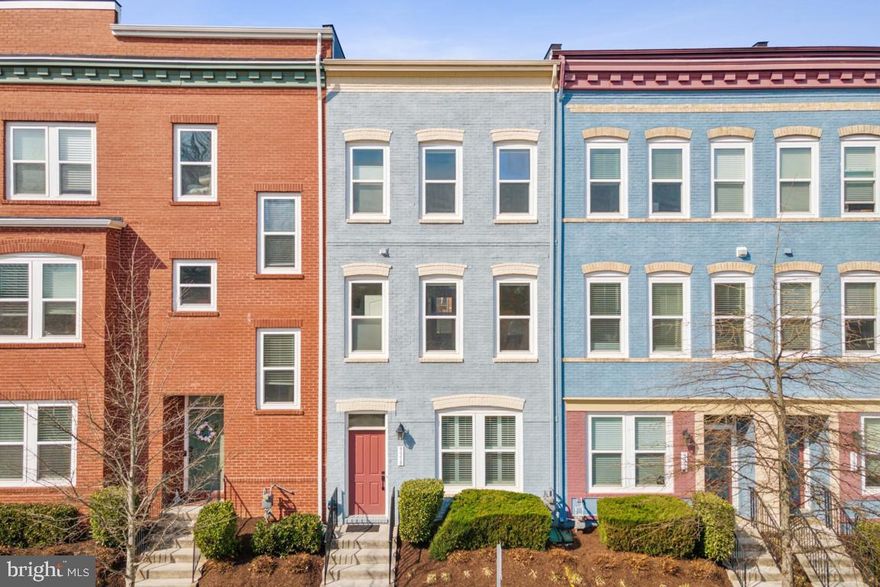 Welcome to this charming three-level bright and airy townhome, offering a perfect blend of modern upgrades and comfortable living space. The main level greets you with a spacious living room that flows seamlessly into the open kitchen, featuring a large island and updated appliances—ideal for cooking and entertaining. Beautifully updated hardwood floors add warmth and elegance to this level. Step out back where you can enjoy the spacious patio, perfect for relaxing or hosting outdoor gatherings. On the second floor, you'll find a versatile bonus area that can be used as a home office, den, or any space that suits your needs. The primary bedroom is also located on this level, offering a peaceful retreat with ample space and comfort. Two generously sized bedrooms and a full bath can be found on the third level, each with plenty of closet space. This home is conveniently located near many restaurants and shops, with easy access to the train and minutes to major commuter routes. WELCOME HOME!