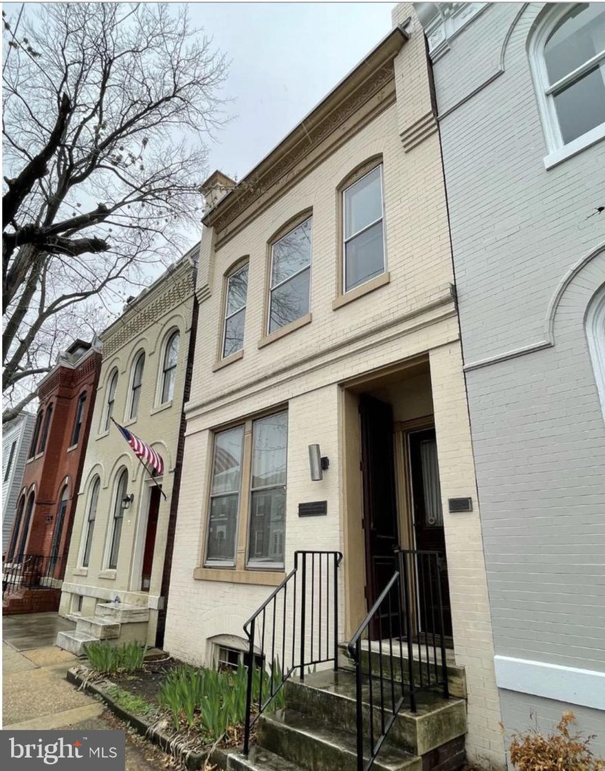 RESIDENTIAL POTENTIAL IN OLD TOWN ALEXANDRIA!   Come and see this fantastic 1890's vintage Alexandria, Virginia town home.  Classic brick construction.  Located far enough off King Street that you can enjoy Old Town, yet are spared the noise and commotion of homes closer to King.  Property may be used for commercial or residential.  Conduct business in the reception area while living upstairs?  The options are limited only by your imagination.   Parking in the alley for at least two automobiles.