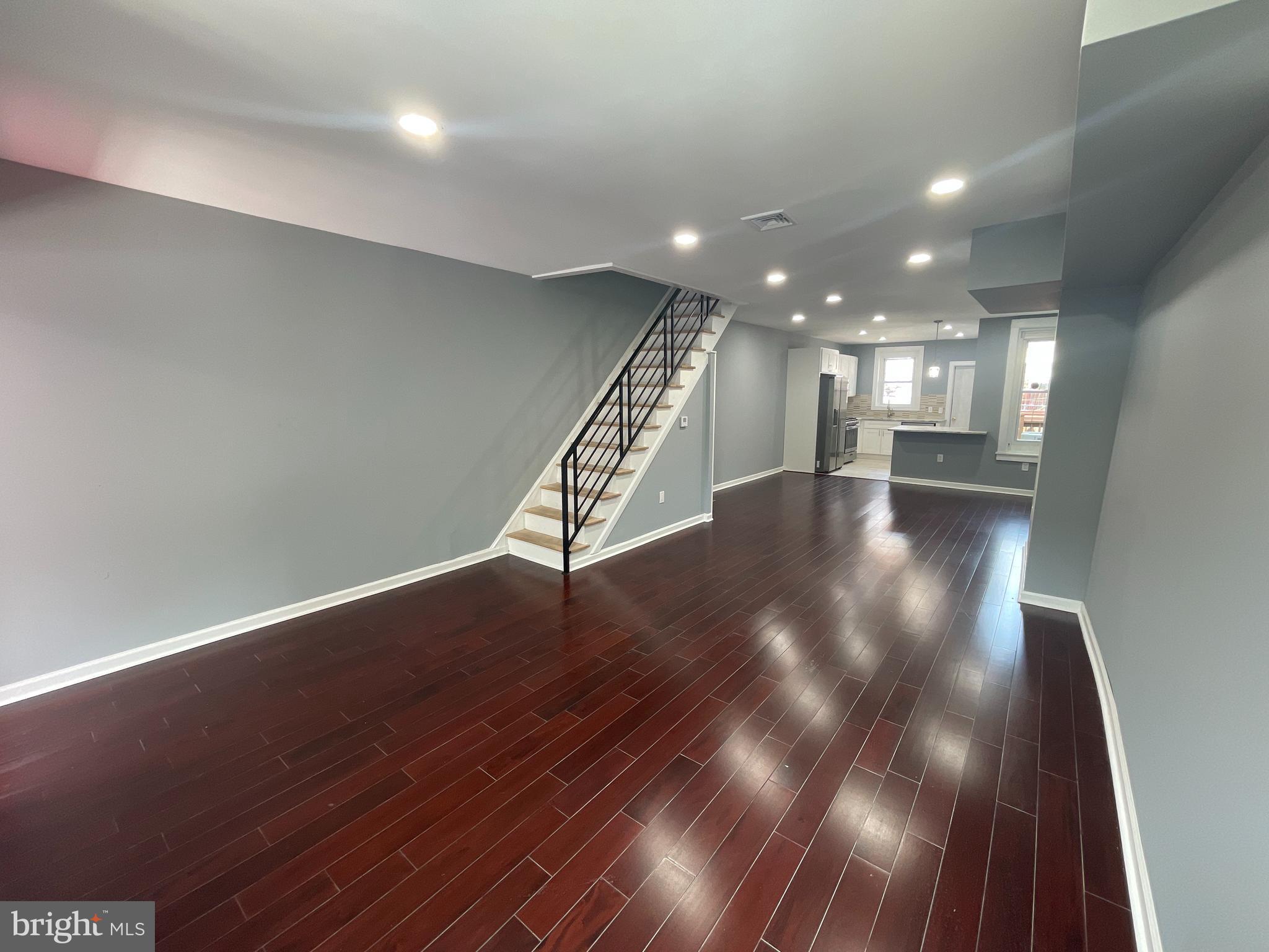 Welcome to 1333 Foulkrod st located in the heart of Frankford section of Philadelphia. Situated on a nice ample quiet block, you will be in awe from start to finish. The front exterior offers a patio paved section great for larger gatherings just in time for the warm weather. Enter to a spacious enclosed porch with a bay window allowing tons of natural light. The main level offers a fully open concept with recessed lights and hardwood floors extending to the large living and dining area. Marvelous kitchen equipped with white shaker cabinets, custom backsplash, granite countertop, and all brand new stainless steel appliances. Cozy deck in place to gather with a bit more privacy. The second level has 3 ample bedrooms with closet space and new laminated flooring. Meticulous full bathroom with floor-to-ceiling ceramic tile with a stand-up shower and glass sliding doors. The basement is large and fully finished and can be used in many ways, bonus room in the rear, perfect for an office room for those that work from home, and a gorgeous full bathroom was added to your convenience. Come take a look!