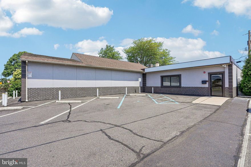 Exceptional Commercial Opportunity in Prime Levittown-Middletown Corridor

Position your business or dental/medical practice for success in one of Bucks County's highest-traffic zones-just a few minutes from Oxford Valley Mall. This fully remodeled, stand-alone commercial building offers exceptional visibility with over 9,000 vehicles passing daily, providing unmatched exposure and access in a thriving, business-friendly area.

Every major system has been updated - including a new roof, HVAC, plumbing, and electrical - delivering value and true turnkey convenience. The property also features a professionally installed, enterprise-grade hardwired IT network infrastructure, providing a robust and reliable foundation for modern medical or professional operations.

Zoned Commercial Medical, the property includes dedicated parking for both employees and patients/clients, with eight private employee spots behind the building and seven front-facing spaces for patient/client access - a rare advantage in a market where parking is at a premium. With secure, designated parking for team members and visitors alike, this property helps attract and retain top talent while offering clients a stress-free arrival experience.

The property is ideally suited for general dentistry practices, with tremendous upside potential for orthodontists, endodontists, and periodontists looking to expand or relocate. The interior includes six fully equipped exam rooms, each networked, plumbed, and wired, along with three wall-mounted X-ray units and a central suction compressor - ready for immediate dental use. 

Beyond dental, the flexible zoning and layout accommodate a wide range of professional uses, including primary or pediatric care/family medicine or specialty medical practices (such as podiatry, dermatology, physical therapy), chiropractic or acupuncture clinics, mental health or counseling centers, speech or occupational therapy, audiology, medical spa and aesthetic services, wellness or nutrition counseling, and outpatient diagnostics. Non-medical possibilities are essentially limitless but include insurance, title services, real estate or mortgage offices, law firms, accounting or tax professionals, IT and cybersecurity consultancies, boutique marketing or design studios, and even coworking or executive office suites. The space is also well-suited for veterinary or pet grooming services, home care agencies, and specialty retail or supply businesses.

Located just steps from three schools and township administrative offices, this site enjoys consistent foot traffic and strong neighborhood engagement - making it a strategic choice for businesses seeking visibility, accessibility, and long-term growth.

Included in the sale is an additional parcel: 6 Green Lynne Dr (Tax ID 05-036-466), a 3-bedroom, 1-bath single-family home located directly behind the main property. Currently rented at $1,400/month (below market value), this residence offers a valuable supplemental income stream and potential for higher future returns. It also opens the door for use as staff housing, an on-site manager's residence, or conversion to additional office or storage space, adding long-term flexibility and investment appeal.

Don't miss this rare chance to secure a completely modernized property that offers exceptional flexibility to match a variety of professional needs and is strategically located in one of the region's most sought-after commercial hubs!

*New tenant (acupuncture and massage studio) signed a 5-year NNN lease on 7/1/2025 at $3500/month base rent.* *Great investment opportunity.*