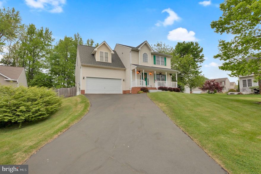 This charming 2-Story Colonial home offers a spacious layout perfect for modern living. As you approach, you'll be greeted by the inviting full front porch, ideal for enjoying lazy afternoons or sipping your morning coffee. -- Upon entering, you're welcomed into a bright and airy living room adorned with gleaming hardwood floors, providing an elegant yet cozy atmosphere for gatherings or relaxation. The oversize kitchen is a chef's dream, boasting ample counter space, modern appliances, and plenty of room for dining and entertaining. -- Adjacent to the kitchen, the separate dining room provides an intimate setting for family meals or dinner parties, featuring lovely views of the surrounding landscape. -- Upstairs, you'll find four generously sized bedrooms, each offering comfort and privacy for the whole family. The primary suite is a peaceful retreat, complete with a private ensuite bath with a soaking tub for added luxury and convenience. -- The full finished basement adds versatility to the home, offering additional living space in the form of a family room, perfect for movie nights or game days. There's also an exercise area, ideal for staying active without leaving the comfort of home, as well as a full bath and laundry facilities for added convenience. -- Outside, the fenced backyard provides a safe and private space for outdoor activities and gatherings, whether it's hosting BBQs or simply enjoying the fresh air. -- With a 2-car attached garage providing ample parking and storage space, this home truly has it all. Don't miss your chance to make this beautiful property your own!