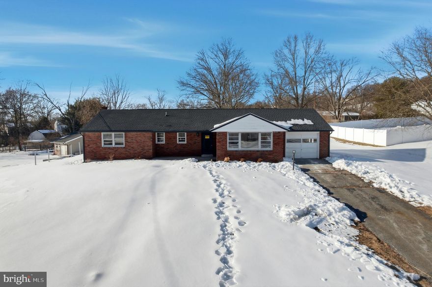 WOW… This is the one you’ve been waiting for! Welcome to 1411 N Adams Street in highly desirable Lower Pottsgrove Township featuring a fully renovated, absolutely stunning ranch with over $115,000 in upgrades throughout. From the moment you step inside, you’ll fall in love with the modern finishes and thoughtful design. The main level offers a bright and inviting living room, spacious dining area, beautifully renovated kitchen, three generously sized bedrooms, and two fully updated bathrooms, including a primary suite with ample closet space and a private ensuite bath. Enjoy true one-floor living with convenience and style. The expansive full basement adds significant additional square footage and showcases a sleek industrial vibe—perfect for a second living space, gym, office, or entertainment area. Outside, the home sits on nearly half an acre with a peaceful backyard, gorgeous brick curb appeal, a 2-car garage, and a fantastic neighborhood setting. Major upgrades include a brand new kitchen, new bathrooms, new roof, new flooring, upgraded HVAC, fresh paint throughout, and so much more—truly move-in ready. Conveniently located near Route 100, Route 422, and endless shopping and dining, this home offers modern upgrades, space, privacy, and location all in one. Homes like this do not last—schedule your private showing today.