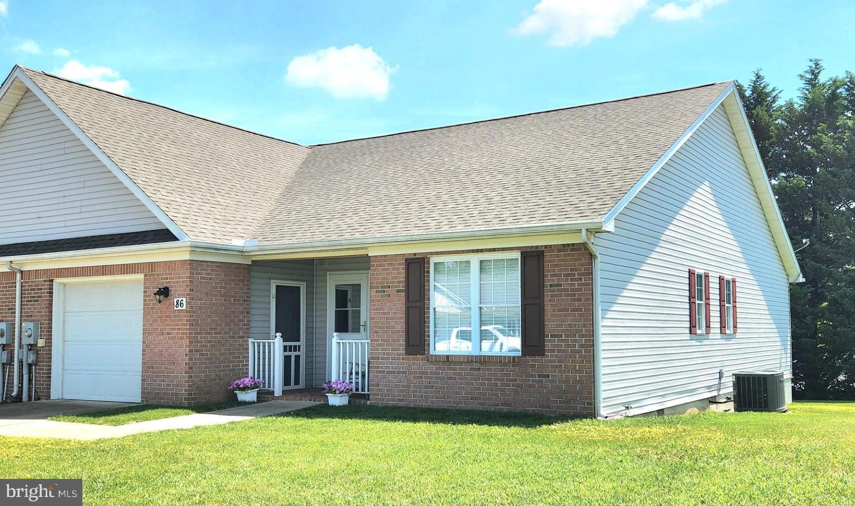 Well maintained, one level Villa in Tuscawilla Hills S/D. Relax on your front porch or enjoy your back deck. Just minutes away from Locust Hill Golf Course and the Handy Mart. This home features 2 bedrooms/2 full baths, country kitchen with sitting area, living room, dining room, mudroom and laundry room. One car garage. Brick front. New roof in 2022, wood flooring in living room, dining room and bedrooms.