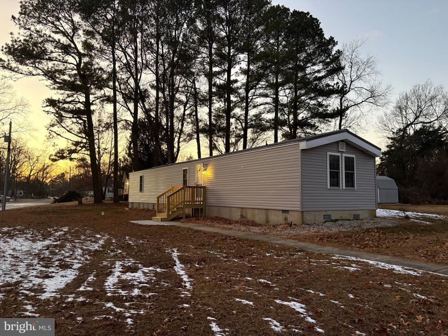 Welcome to this completely remodeled Class C home situated on a permanent foundation with a retired title, offering true homeownership on 0.41 acres with no lot rent and no HOA. This move-in-ready property has been fully renovated from top to bottom—featuring all new flooring, fresh paint, updated light fixtures, and brand-new appliances. Major system upgrades include a new HVAC system, new roof, and new hot water heater, providing peace of mind for years to come. The inviting interior feels fresh and modern, while the rear shed conveys with the sale, offering additional storage. Located in a quiet neighborhood, this beautifully updated home is welcoming, turnkey, and truly a must-see.