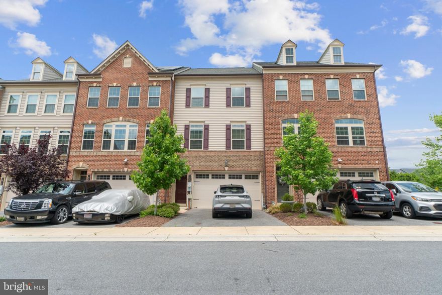 GORGEOUS TOWNHOME LOCATED IN THE SOUGHT-AFTER PARKSIDE COMMUNITY WITH 2 CAR GARAGE PARKING NOW AVAILABLE. 3 BEDROOMS WITH 3.5 BATHROOMS. GLISTENING UPGRADED HARDWOODS CASCADE THROUGHOUT. ENJOY CUSTOM CABINETRY, IMPORTED TILE, RECESSED LIGHTING, GRANITE COUNTERTOPS, SS APPLIANCES IN DESIGNER CHEF'S KITCHEN WITH OVERSIZED ISLAND.  PRIVATE REAR DECK OFF KITCHEN. LOADS OF NATURAL LIGHT. HIGH CEILINGS THROUGHOUT. WALK-IN SHOWERS. WALK-IN CLOSETS. FINISHED LOWER LEVEL - GREAT FOR SECONDARY GREAT ROOM, PLAY ROOM, OR HOME OFFICE. PRIVATE FENCED IN YARD. POOL AND CLUBHOUSE ACCESS. CLOSE PROXIMITY TO RETAIL SHOPPING, LOCAL DINING, AND ALL MAJOR HIGHWAYS. SCHEDULE A PRIVATE TOUR TODAY!