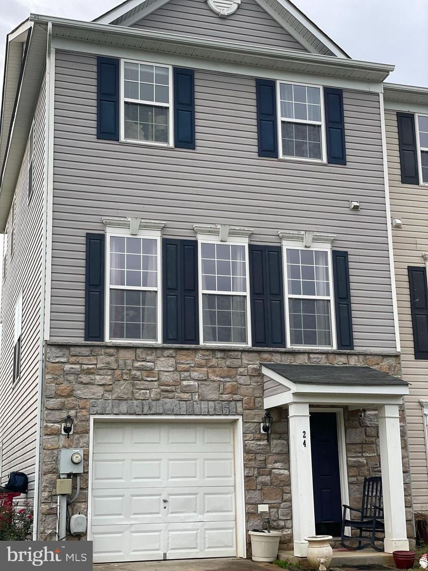 Lovely 3 bedroom, 2 full and 2 half bathroom end unit townhome in the Liberty Run community. This is a large 3 story townhome with a one stall garage. As you walk in the first level, you'll find plenty of space to entertain, a laundry room, and you can walk out into the fully fenced backyard. On the second level the kitchen boasts upgraded cabinets, and a lot of natural light.  The third level is equipped with 3 bedrooms and two full bathrooms. Unique engineered hardwood floors throughout, the only place you will find carpet is in the closets.  Close proximity to shopping, historical Harpers Ferry, and I-81.