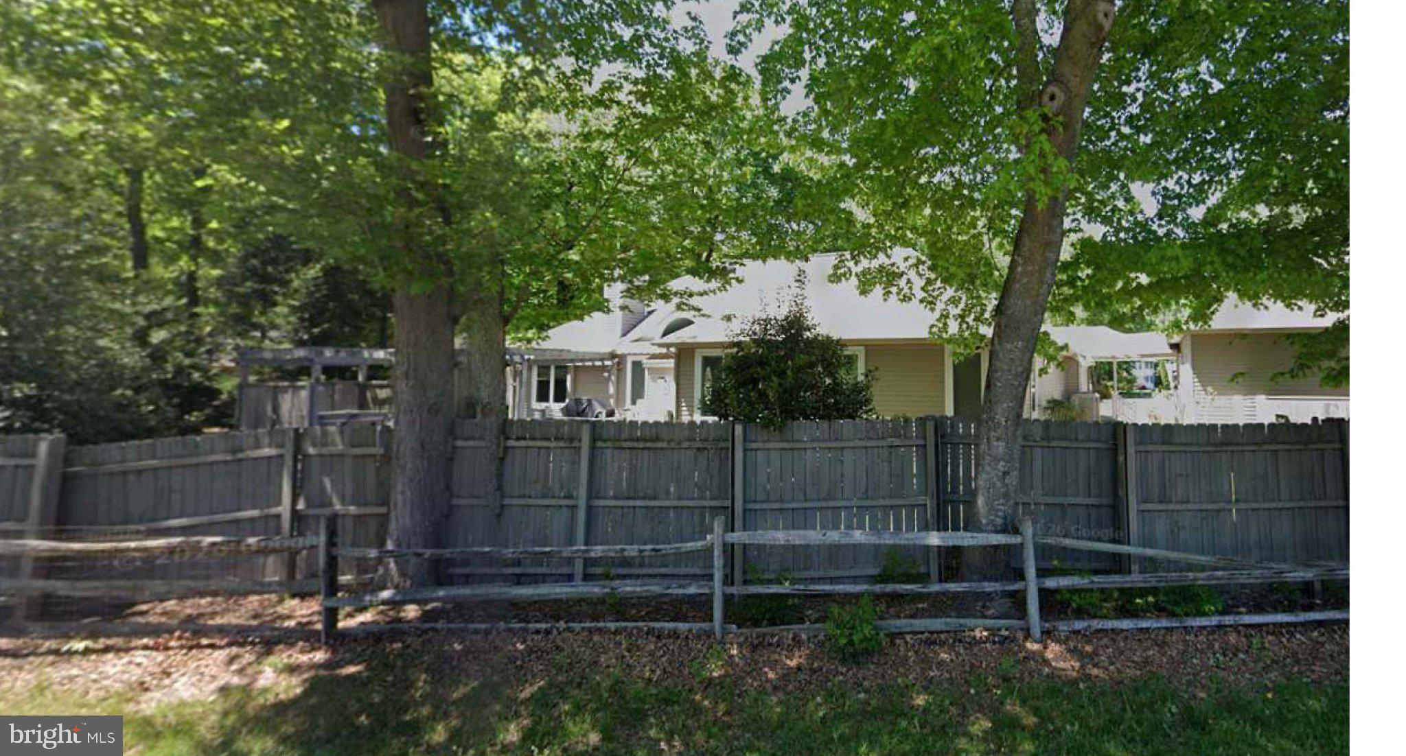 211 WOODLANDS COURT