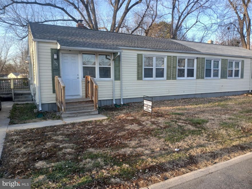 Location gyves easy access to all amenities....  MARC is a short walk, as are schools, shopping and downtown. Nicely remodeled unit with expanded bath/laundry combination.  New carpet, Fridge, washer and dryer.  SELLER gives $500 credit for Buyer's warranty of choice.