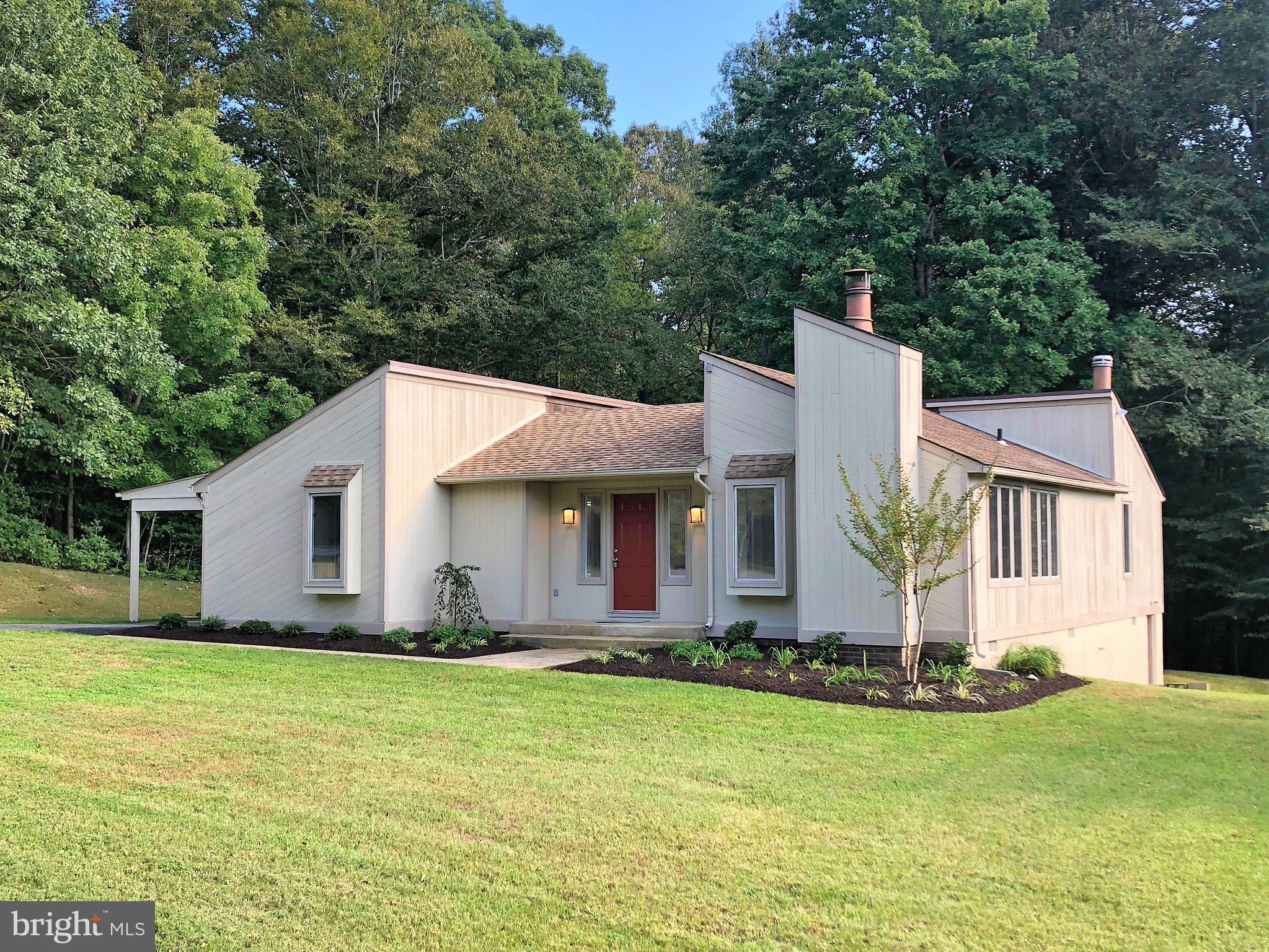 An array of windows fill this contemporary home with beautiful natural sunlight! Amenities include a center atrium with landscaping and a paver patio; a remodeled kitchen with granite countertops, white cabinetry & stainless appliances; remodeled bathrooms, a living room with a fireplace, beautiful laminate flooring and a carport. Fantastic North Calvert Dunkirk Location! Pets case by case with $500 pet deposit plus $50/month per pet. Available beginning May 15th.