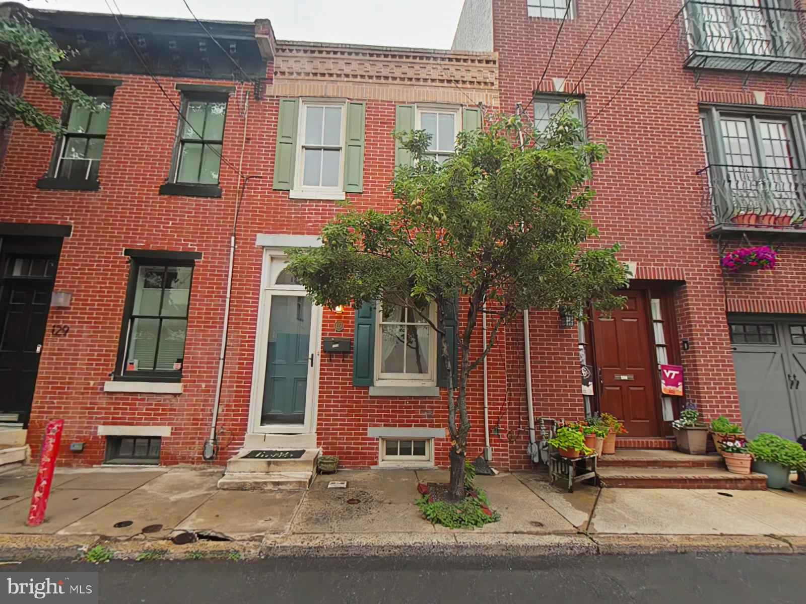 Sale is subject to third-party approval. Located in the heart of Queen Village and within the highly sought-after Meredith School District, this charming 2-bedroom, 2-bath home blends historic charm with modern comfort perfect for homeowners looking to live comfortably in the city.
The exterior showcases a classic brick façade and original cornice, while the interior features hardwood flooring throughout, extending from the finished basement to the second floor.
As you enter the home you are welcomed into the cozy living room and dining room area which is the perfect space for entertaining friends and family for special gatherings.
Just beyond the dining area is the well-appointed kitchen which offers both style and efficiency, complete with a center island and stainless steel appliances. The appliances offered are a refrigerator, gas oven range, built-in microwave, dishwasher, and a wine fridge. To top it all off there is even a wall mounted TV. From the kitchen, step outside to a private rear yard ideal for relaxing or entertaining.
The second level offers two spacious, sunlit bedrooms and a full bathroom featuring a tub/shower combo with a glass enclosure, a vanity sink, and mirror. The finished basement adds valuable living space and includes a second full bathroom with a glass-enclosed shower, a laundry area with washer & dryer, and a dedicated utility closet for extra storage.
The location is unmatched being conveniently located near the Riverline Light Rail at the Entertainment Center stop, this home also enjoys close proximity to several community green spaces such as Thaddeus Kosciuszko National Memorial, the Philadelphia Vietnam War Memorial, and Old Pine Community Center.
The neighborhood itself is known for being calm, quiet, and historically charming—offering a true sense of community while still being close to everything the city has to offer. Residents will enjoy nearby dining options including The Twisted Tail, His & Hers Restaurant Bar, Mirage Lounge Philadelphia, and Hurricane Alley, with even more to explore just minutes away. Local schools include William M. Meredith School and Furness Horace High School. Daily essentials are a breeze with South Terminal Market and Queen Village Food Market just around the corner.
This is a short sale subject to 3rd party approval. The home is being sold as-is, where-is with no warranties expressed or implied. Inspections are for informational purposes only. Buyer will be responsible for all FHA, VA or lender repairs if required. Buyer is responsible for obtaining any Certificate of Occupancy if required by the town. All contracts must contain wet signatures as the bank will not accept digital signatures. Buyer must sign all applicable short sale negotiator disclosures – uploaded in the documents section.
A 13-month HWA home warranty will be included with an acceptable offer. This will need to be included in the Agreement of Sale.
Don’t miss this opportunity—schedule your tour today!