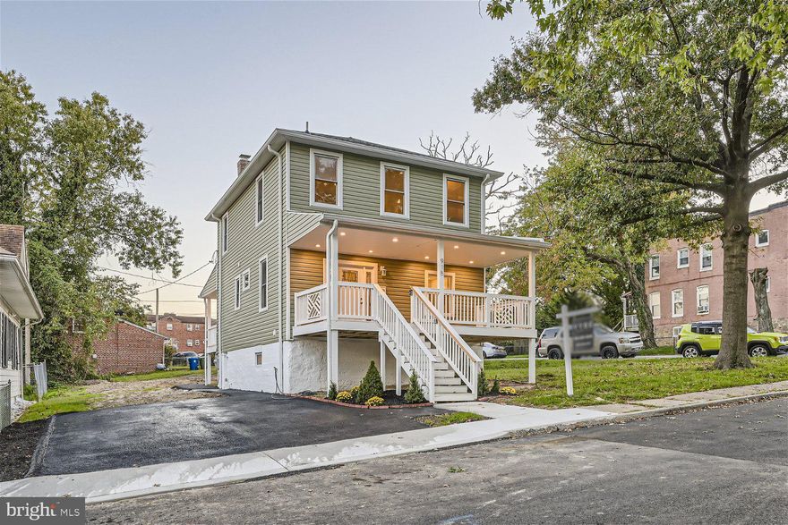 Beautifully renovated 3BR/3.5BA Craftsman style home located on a corner lot in the Pen Lucy neighborhood! Park in the newly paved double driveway, make your way to the large covered front porch, and open the door into your forever home.  Step into a luxurious open concept main floor boasting tons of natural light, high ceilings, easy care flooring, and stunning tray and coffered ceilings. The flow of the main floor allows for the ideal entertainment space offering an oversized living room with a wall of custom shelving and built-ins with accent lighting, a large dining area and gorgeous kitchen.  The kitchen boasts plenty of cabinets, granite countertops with a complimenting backsplash, stainless steel appliances, and a peninsula with seating and pendant lighting.  Tucked behind the kitchen is the convenience of a half bath.  The second floor features a primary owners suite, two sizable secondary bedrooms, and a beautifully tiled full bath with double sink vanities  The owners suite offers a spacious bedroom with a walk-in closet and a private ensuite with a large walk-in shower, tub, double vessel sinks, and a Bluetooth exhaust fan.  Onto the finished lower level featuring another full bath, laundry, storage, a large family room with space for everyone, and a walk-out to the side yard.  Sliding doors in the dining room brings you to a large covered rear deck that overlooks a yard with green space and tons of possibilities. This home is move-in ready with so much to offer new homeowners including recessed lighting, new floor coverings, new windows, and a freshly painted interior.  Imagine all this and in close proximity to Morgan State University, John Hopkins University, Penn Station, and nearby hospitals (Good Samaritan and Union Memorial). Enjoy the convenient location to all of Baltimore!