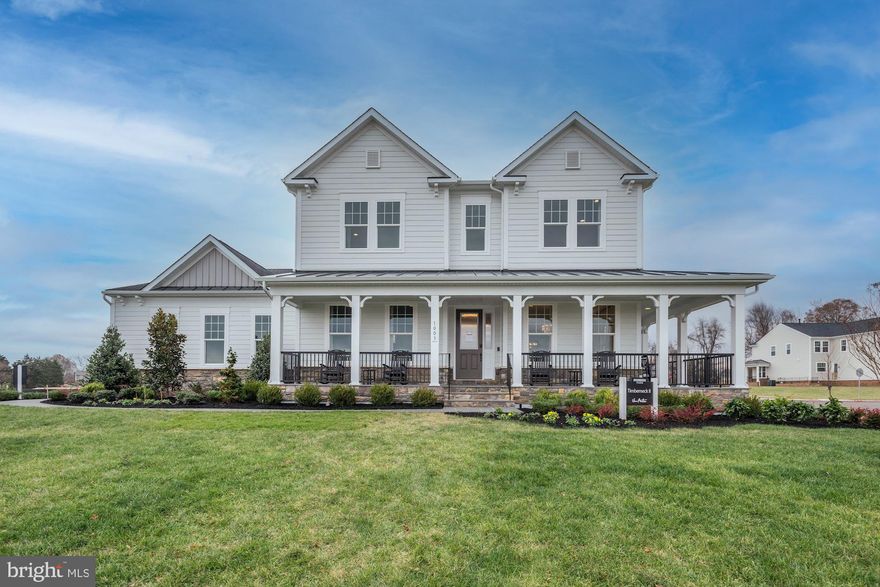 GORGEOUS BRAND NEW fully loaded home with a LOT OF UPGRADES on a premium lot in a sought after neighborhood built by Van Metre homes. The home features - 3 car garage, full front porch, stone stoop, covered screen porch with trex deck in the back, upgraded LVP flooring on main and basement levels, extra windows, gas fireplace, oak staircase with custom metal rails, Luxury Chef's Kitchen with quartz countertops, upgraded cabinetry, stainless steel high end energy efficient appliances, under/inside cabinet lighting, exhaust vent to the outside, extra large pantry, large mud room with tub sink, upgraded bathrooms, master bedroom with coffered ceilings, a full bath with a bedroom and rec room in the basement, space for a movie theatre and more. Upgraded lighting, speakers and additional A/V features thru-out. PHOTOS OF MODEL HOME (SAME FLOORPLAN)