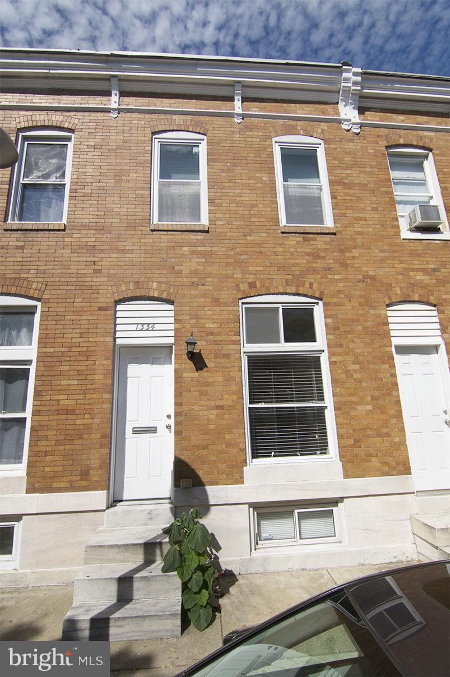 Located just steps from active Carroll Park. Wonderful renovated bright home w/ hardwood floors throughout, open concept first floor, white kitchen with ceramic counter top. 2nd level offers two spacious bedrooms on each end of the house and center family room under skylight and full bathroom. Finished lower level with laundry and flush. Convenient to I95,695, Inner Harbor & transportation.