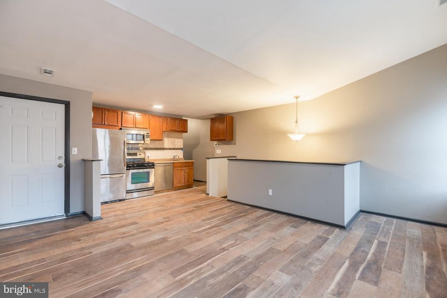 NEWLY UPDATED 3RD FLOOR APARTMENT IN A 5 UNIT BUILDING IN THE HEART OF FELLS POINT!  Location, location, location!  Walking distance to Fells Point shopping & restaurants & Harbor East!  Apartment features a spacious living room, updated kitchen w/ stainless steel appliances, 2 bedrooms, 1 full bath, & shared rear patio!