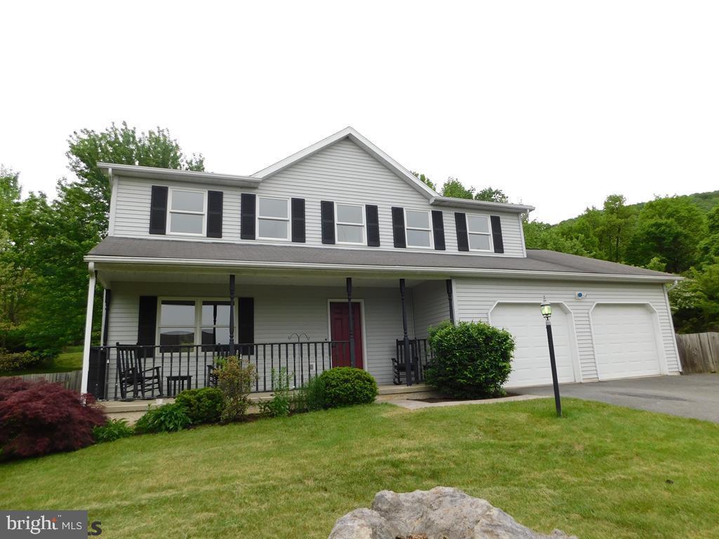 This move-in-ready 2 story home in the wonderful Brockerhoff Heights development will bring a smile to your face.  Freshly painted and new carpet throughout, this spacious home has 4 bedrooms and 2.5 bathrooms, an open floor plan with large L-shaped living room plus lower level rec room.  You'll find lots of room to spread out in the generous sized owners bedroom with walk-in closet and owner's bath, plus 3 additional nicely sized bedrooms & full bath on the second floor.  Outside you can relax on the front porch in the evening and take-in the beauty of the twinkling lights of historic Bellefonte or entertain in the private fenced backyard that backs up to wooded space.  Great house, beautiful views, convenient location with easy access to 1-99/1-80.  Make sure you call today to see this special home.