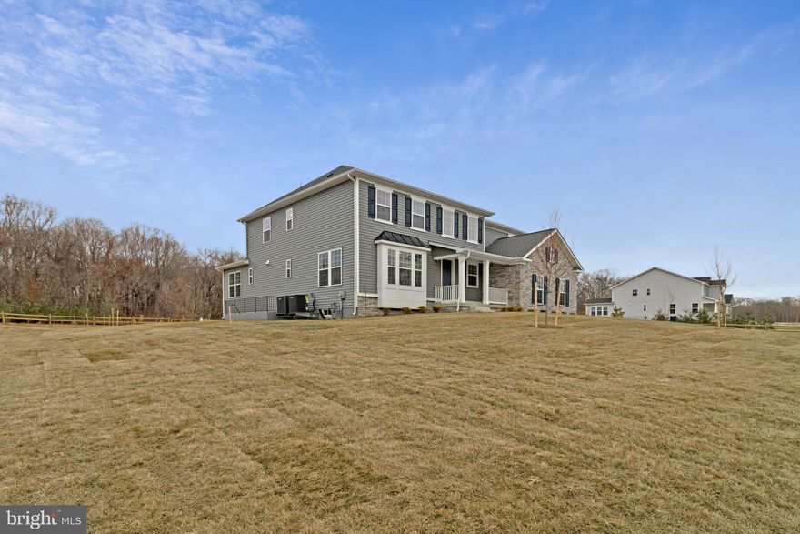 Preston Elevation E with stone water table, an inviting covered porch, and continues to impress with formal dining room, spacious great room with electric fireplace, well- appointed kitchen featuring a center island, walk - in pantry and nook. A mudroom, full bath, with bedroom on 1st level, private study with French doors, Gormet kitchen, upstairs has laundry and loft area, three secondary bedrooms with shared bath, elegant primary suite boasting an attached bath and expansive walk-in closet. sunroom off the rear of home with covered porch and finished basement with additional bedroom and full bath