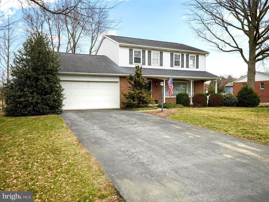 Welcome to Meadow Lane     Custom Built Home, featuring Cushwa handmade bricks.  Front double doors leading into the flagstone foyer. Cherry cabinetry in the spacious kitchen featuring space for a breakfast area.   All appliances convey including the washer and dryer.  Beautiful family room with wainscoting, built ins and a brick wood burning fireplace. Family room leads to the sunroom.  formal dining room and formal living room.   Second floor boasts 4 bedrooms and two bathrooms.  Two car attached garage.  Full unfinished basement.
