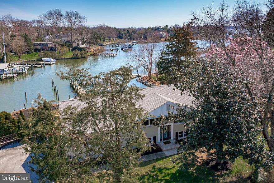 Welcome to your idyllic waterfront retreat in Wild Rose Shores, where everyday living feels like a vacation! Just minutes from downtown Annapolis, yet feels like a peaceful countryside escape as you drive past horse farms, estates, and open fields - this location stands as one of the most highly sought-after in town.

Just off the South River and Little Aberdeen Creek, this property offers expansive waterviews from all your living spaces. It is a perfect combination of location, gentle slope to the water, deep-water pier, and updated interior. The pier offers 6FT+ (MLW) depth, ideal for accommodating large sailboats, and features multiple boat slips with two boat lifts—one with a capacity of 16,000 lbs. and the other with 12,000 lbs. It also features 115 ft of bulkhead.

The all-brick home with approximately 3000 sq ft of living space has been updated over the years to ensure modern conveniences. It also features an oversized 24 x 30-foot garage with 12-foot ceilings, great for multiple vehicles and storage. Recent renovations include updated bathrooms, a renovated kitchen, new insulation in walls and roof, new flooring, and newer Low E thermal windows. Major infrastructure updates such as a new roof (2022), HVAC system (2023), water heater (2021), and a new well pump (2023) ensure peace of mind for the future.

Don't miss your chance to make this your own – seize the opportunity and start living the Annapolis waterfront lifestyle today!