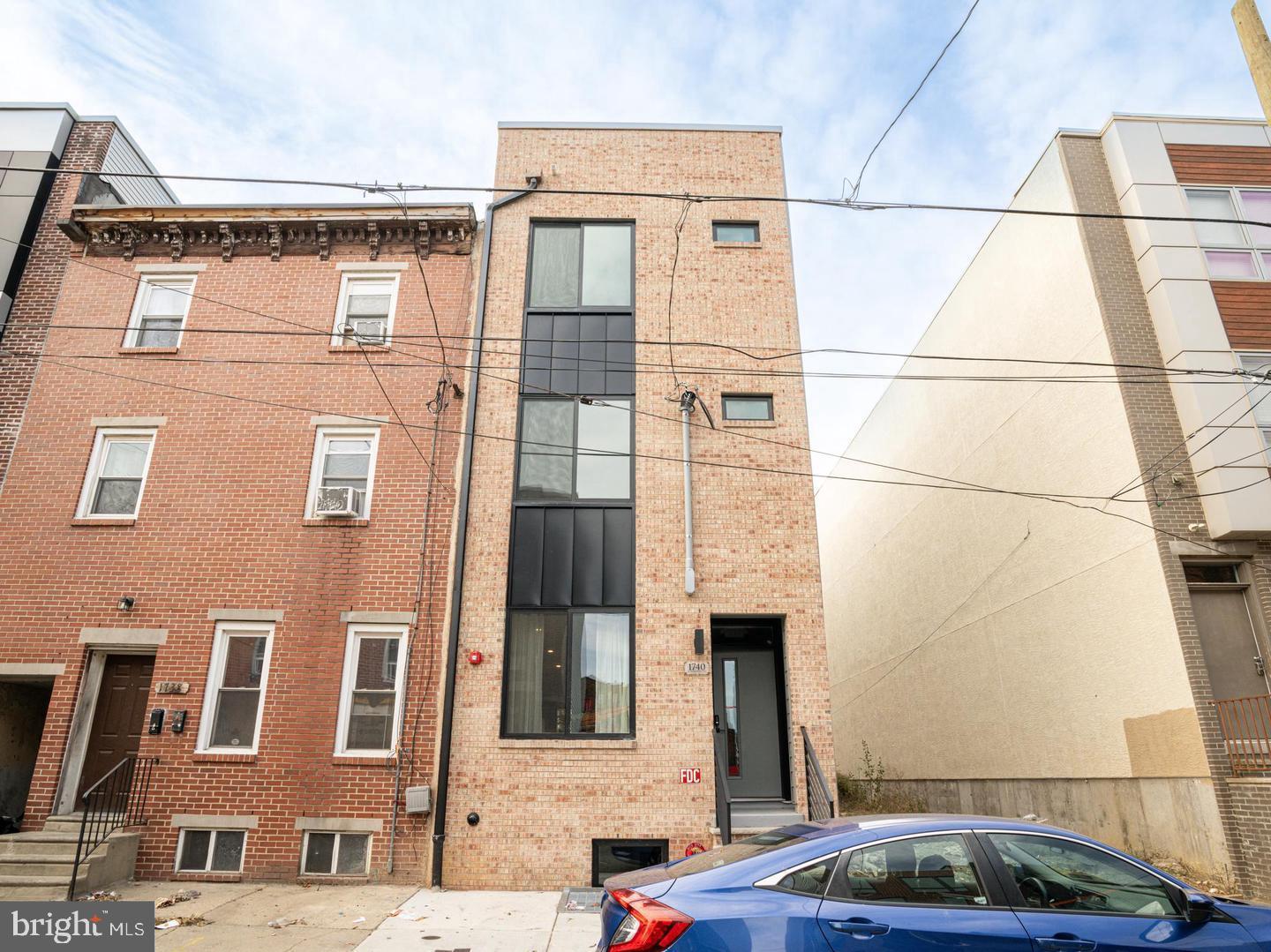 Welcome to 1740 N Marshall Unit 1 an exquisite newly constructed luxury rental situated in the vibrant South Kensington neighborhood. There are very few 4 bedroom houses or apartments anywhere in Northern Liberties and South Kensington, let alone the City but it is here !! And this location is exceptional, providing convenient access to some of Philadelphia's premier dining establishments and cafes. The surrounding area is undergoing rapid development, which promises sustained growth and increased desirability. The triplex comprises three meticulously designed units with high-end condo quality finishes: * For Unit 1 it is very generous bi-level unit with 4 bedrooms and 3 bathrooms, complete with your own private yard. * Each unit is adorned with high-quality finishes, including custom locally-made cabinetry, quartz countertops, premium stainless steel appliances, and Bespoke tile work in the bathrooms. Modern amenities such as Nest thermostats, video intercom systems, and electronic keypads enhance both comfort and security. All mechanical systems are of the highest standard, featuring Lennox HVAC, Anderson windows, and a fiberglass roof. Every detail has been carefully considered, from doors and hardware to all other features. Every unit exudes a sense of luxury, characterized by contemporary layouts and an abundance of natural light, with every bedroom providing ample closet space and storage options throughout. Also, each unit is ideal for entertainment with a custom built-in area for TV and modern tech with the luxury decor this one having that private outdoor space.. Given its prime location, upscale features, and amazing walkability for lifestyle and luxury, this unit is unlikely to remain available for long. It is currently vacant and readily available for viewing and move in. . Schedule your appointment today. Applicants to make 3x the monthly rent in verifiable net income, credit history to be considered, no evictions within the past 4 years, and must have a verifiable rental history with on-time rental payments.