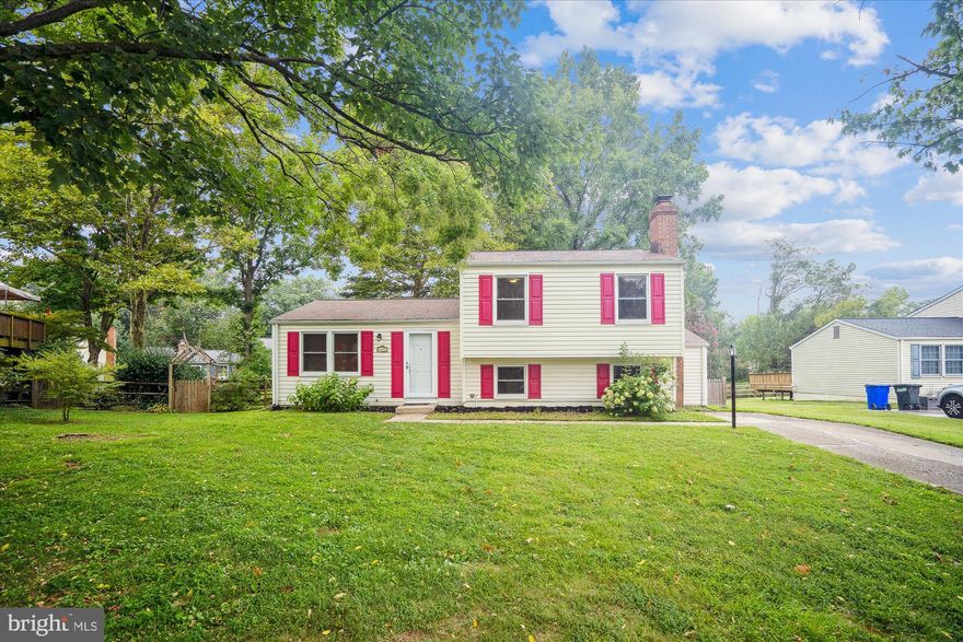 Beautiful Split Level Home in Columbia.  This home has everything you need and more.  Located on a quiet cul-de sac in a great neighborhood.    Enter on the main level to find a bright and gleamy Living Room with hardwood flooring and lots of windows.  The kitchen features updated maple cabinets, and stainless steel appliances.  Step out from the adjoining Dining Room to a huge private deck, which is perfect for entertaining or enjoying nature.  Upstairs you will find the primary bedroom, and two additional bedrooms with ample living and closet space.  Enjoy relaxing in the lower level family room with a wood burning fireplace, custom built bookshelf, and LVP flooring.  Don't forget to check out the additional storage space under the stairs.  There is also an enormous storage room accessible from the rear of the home, with plenty of space for your bikes, and other outdoor activity items, or it can function as the perfect workshop.  Lots of other updates so you don't have to spend another dime living here, including New HVAC 2023, New Stainless Steel Stove, Washer & Dryer 2019, New Microwave 2023, Roof 2016.