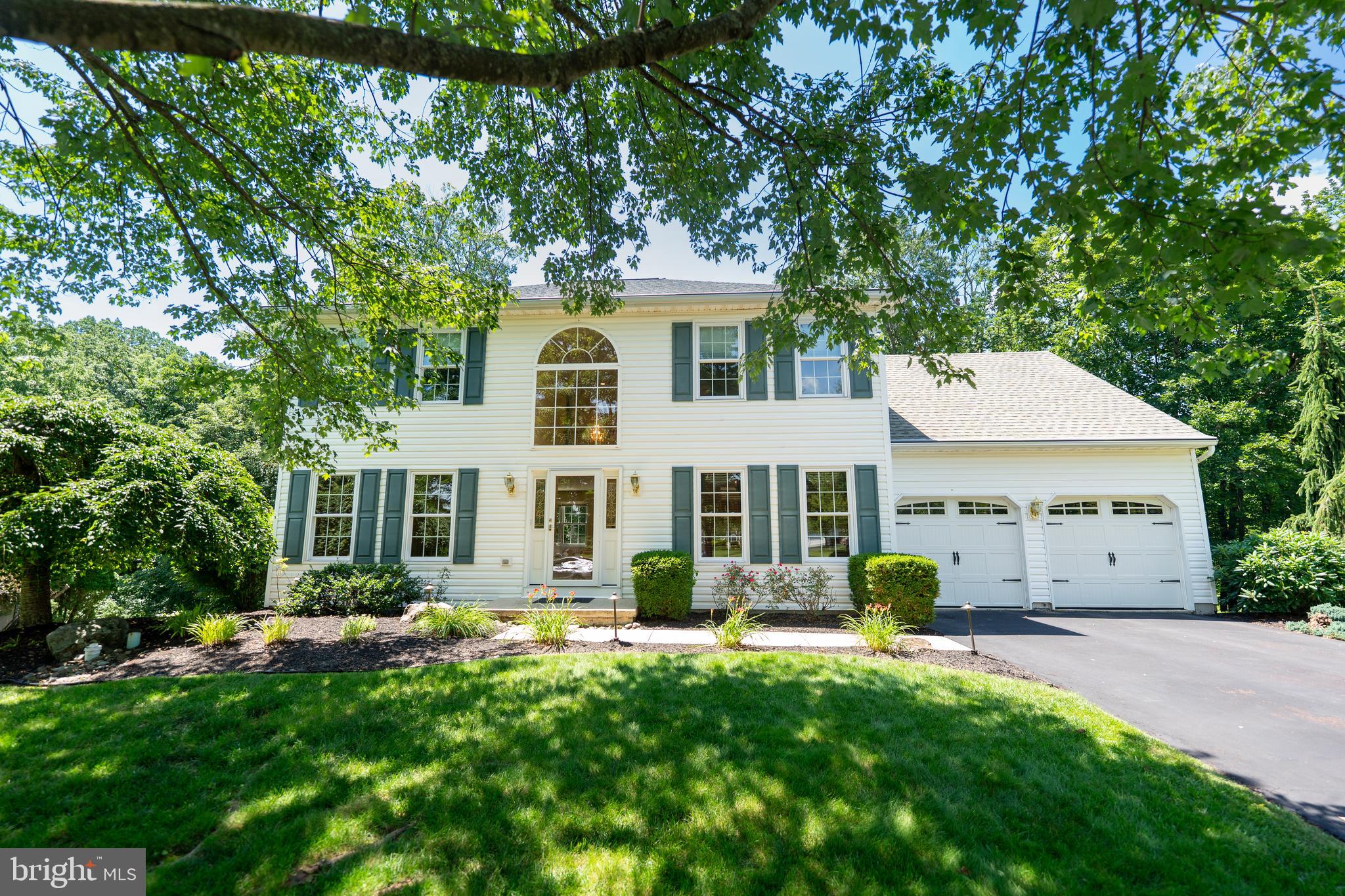 Welcome to Coddington Way nestled in the highly desirable Beechwood neighborhood in Harleysville. This well maintained 4 bedroom, 2.5 bath colonial offers coziness and convenience with many things to appreciate. The quiet neighborhood and peaceful tree-lined backyard is ideally located with easy access to shopping, NE Extension, local lifestyle in Harleysville, Souderton, Skippack and Lansdale area, making commutes a breeze while still providing the peaceful charm of suburban living. Once inside you’ll notice beautiful hardwood floors, lots of natural light and newer quality replacement windows. The Main floor offers the standard spaces as well as built in bookcases, stone veneer fireplace and main floor laundry. The layout is convenient for entertaining and perfect for a family. The finished walkout basement is also accessible to the back patio as well as a 2nd access to the garage. complete with an included bar, creating the ultimate space for hosting guests or unwinding after a long day. The large deck is private to enjoy relaxation and a peaceful secluded evening or invite your friends over to cook out. Upstairs the primary bath was recently remodeled and offers double sinks and a beautiful vanity. Use the extra bedroom for a quest room, hobby space or home office. With nearby parks, and plenty of shopping and dining options in around Harleysville this home offers the perfect location for you call ‘HOME’. Schedule your showing today!
