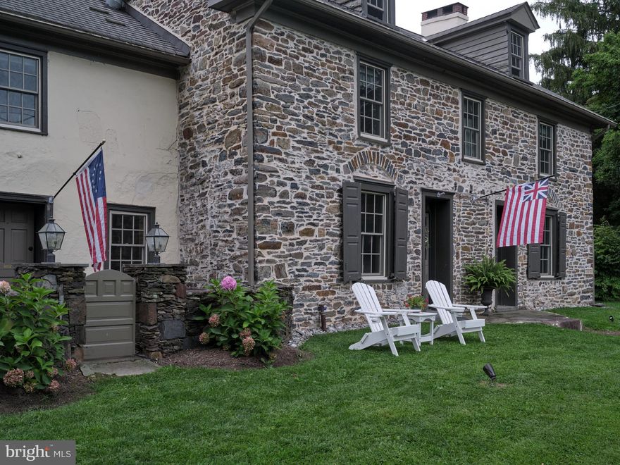 Welcome to picturesque Riverstone 1730 on the banks of the Delaware River. This impeccably maintained property is absolutely stunning and will function as a single residence or multigenerational home. Dating to the early 1700’s, Riverstone 1730 served as a frontier trading post, a Colonial era tavern, and today a versatile residence. Beautifully restored, and meticulously updated in 2017, the home is resplendent with historic charm - wide plank floors, deep window sills, exposed beams, 5 fireplaces, and lovely built-ins throughout. Blend this with modern amenities,  including gourmet kitchen, updated bathrooms, all new Pella windows, new roof, efficient HVAC systems, 400 AMP service, a whole house generator, and then add in spacious bedrooms, several charming living areas, a second kitchen, and one has a fabulous home for entertaining. 
The main level of the home has a Gathering Room, a Study, a Dining Room, and a Family Room, all with fireplaces. Enjoy entertaining? There are two kitchens! The main kitchen has an open concept family room/gourmet country kitchen with soapstone counters and island, a Wolf range with a pot filler, Sub Zero refrigerator/freezer, Fisher & Paykel dishwasher drawers, and plenty of storage cabinets. The accessory kitchen is located off of the dining room and functions as a formal butler's pantry. It has built-in floor to ceiling custom cabinets, an AGA gas range, stainless hood, refrigerator/freezer, farmhouse sink, and a microwave. There is also a laundry area with a stacked washer/dryer, and a powder room on the main level.
Upstairs are a total of five bedrooms. Four are located on one end of the house, sharing a spacious bath with double vanity, large glass shower and soaking tub. The spacious primary en-suite is located on the other end of the house.
Outside you will discover lovely, professionally landscaped gardens, brick patios in the back yard, and stone terraces in the front, a heated and cooled workshop, storage shed, and an oversize 3 bay carport. The driveway is gated and alarmed, and the back yard is completely fenced.  
A large private dock on the river sets the stage for many water activities from swimming, tubing, kayaking, canoeing, jet skiing and motor boating. At the end of the day curl up in an Adirondack chair around the riverside fire pit and watch the sunset. 
Located just across the river from the quaint town of Milford, New Jersey, close to fine dining and wonderful wineries on both sides of the river, this truly a year round vacation destination.
This is a versatile property and can be used as a single residence, a multigenerational home, or if you are interested in extra income, as a  B & B.