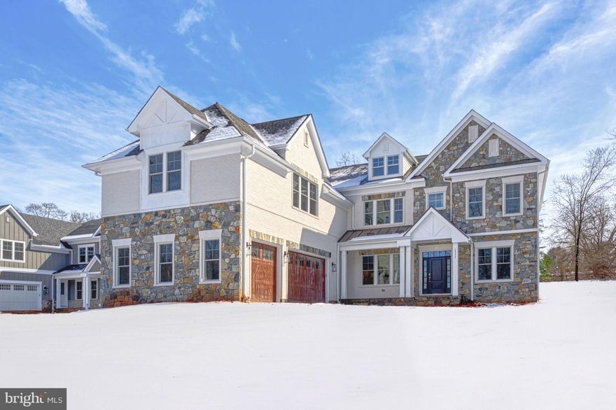 Welcome to this exquisite, newly built Sekas home situated on a beautifully wooded, .78-acre lot, offering both privacy and elegance. This Elevation 3 masterpiece features an upgraded front door and a striking brick and mosaic stone façade, enhancing its curb appeal. With over 7,200 finished square feet, this luxurious residence boasts 7 bedrooms and 7.5 baths, designed for both comfort and sophistication. Step inside to a grand gallery foyer leading to an open-concept layout with 10-ft. ceilings on the main level and 9-ft. ceilings on all other floors. The main-level guest suite with a full bath provides a private retreat, while the formal dining room and light-filled family room create inviting spaces for gatherings. The well-appointed gourmet kitchen is a chef’s dream, featuring upgraded appliances, a beverage center, three walls of cabinetry, and a spacious informal dining area—perfect for entertaining. Upstairs, each secondary bedroom boasts its own private bath, ensuring convenience and privacy. The expansive owner’s suite is a true sanctuary, complete with two large walk-in closets with upgraded shelving, a dressing area, and a deluxe bath featuring a separate shower, soaking tub, and water closet. The finished lower level offers endless entertainment with a home theater with AV closet, a custom wet bar, a large recreation room, an exercise room, and a 5th bedroom with a full bath. The bonus space with a vaulted ceiling, walk-in closet, and full bath adds even more versatility to this already impressive home. From upgraded plumbing and lighting to high-end finishes throughout, every detail has been thoughtfully designed for luxury living. In addition, this secluded homesite is in a scenic setting with Spring Lake membership. Enjoy access to this special, 4 acre lake in the heart of Vienna. Offering residents a unique lifestyle. With docks around the water you can explore by kayak, boat or canoe and fish for largemouth bass, bluegill, and rainbow trout. Get away from the hustle and bustle of life while living mere minutes from downtown Vienna and all it has to offer.