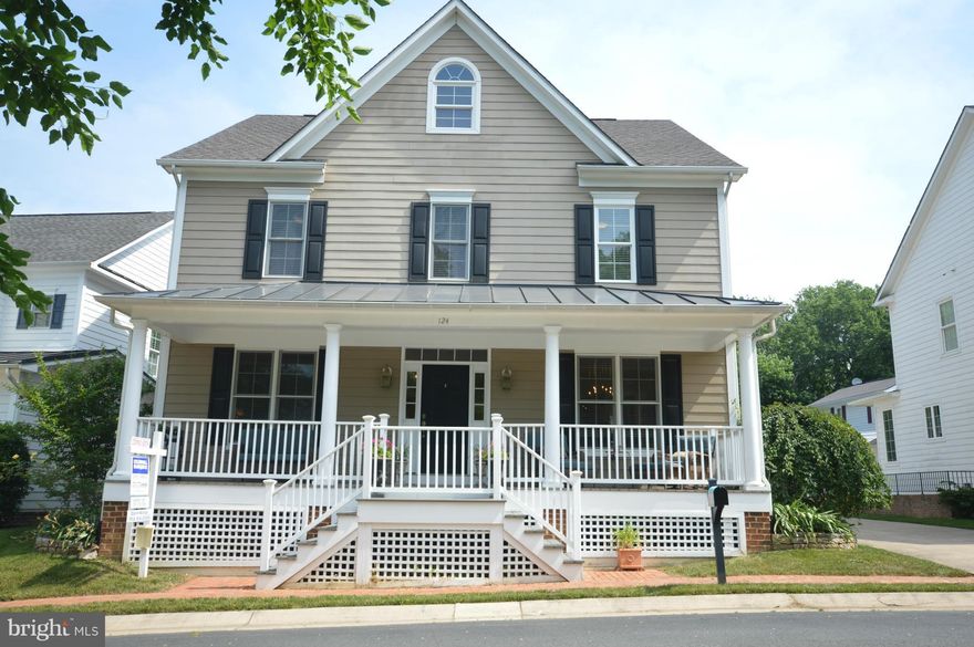 GORGEOUS HOME WITH OPEN FLOOR PLAN AND TONS OF NATURAL LIGHT. INVITING PORCH THAT OVERLOOKS A PARK LIKE SETTING. BEAUTIFUL HARDWOOD FLOORS THROUGHOUT THE MAIN LEVEL AND UPDATED KITCHEN THAT OVERLOOKS THE FAMILY ROOM WITH FIREPLACE. ALL NEW CARPET UPSTAIRS. FINISHED BASEMENT WITH REC ROOM, FIREPLACE AND FULL BATH. LESS THAN 1 YEAR OLD DUAL FUEL ZONED HVAC. TANKLESS WATER HEATER. HOME WARRANTY!