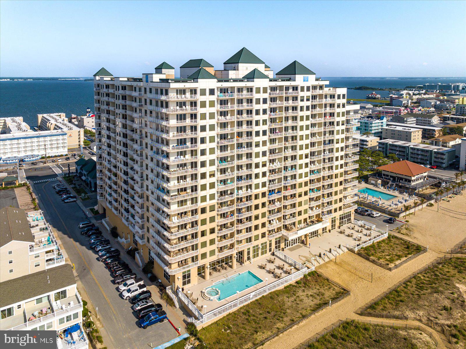 Fully customized and upgraded this Oceanfront residence at the Luxurious Gateway Grand is now available! Featuring the coveted AA floorplan, which showcases a direct oceanfront primary suite allowing you to fall asleep and wake up to the majestic and everchanging Atlantic Ocean. This suite includes a huge plate glass viewing window and effortless gliding sliding glass door that allows immediate access to the oceanfront balcony. All flooring throughout has been replaced, featuring driftwood wide plank tile with matching tile baseboard in the living room, dining room, kitchen, bathrooms, and closets. The bedrooms also feature upgraded quality pad and carpet. All countertops have been replaced with thick Carrara marble in the bathrooms, kitchen, and desk area. The kitchen boosts all new appliances including a massive 46 inch Subzero counter depth side by side refrigerator, a separate Subzero beverage refrigerator in the island, and double door stove with built in air fryer. The kitchen cabinets have been upgraded with custom pull out dryers making everything held within easily accessible. All fans, light fixtures, and light switches throughout the residence have been upgraded and include dimmers and toggle new switches. Everywhere you turn there are conveniences, from the hardwired water fountain in the foyer to the electronic dampered high power exhaust fans in the bathrooms. Each closet features custom organizers and lighting. This property is delivering furnished including high end luxury pieces, wall mounted TVs, and custom window treatments. A ground floor deeded storage locker #64 also conveys to store all of your beach items. The Gateway Grand complex offers an abundance of amenities including heated indoor and outdoor pools, multiple lounges featuring TVs and WIFI, a kid's activity room, 24/7 fitness center, on-site professional management, maintenance, and security, surveillance camera system, attached parking garage with electric car chargers, and a stunning professionally decorated lobby. This is your opportunity to own one of the nicest condominiums at the beach!