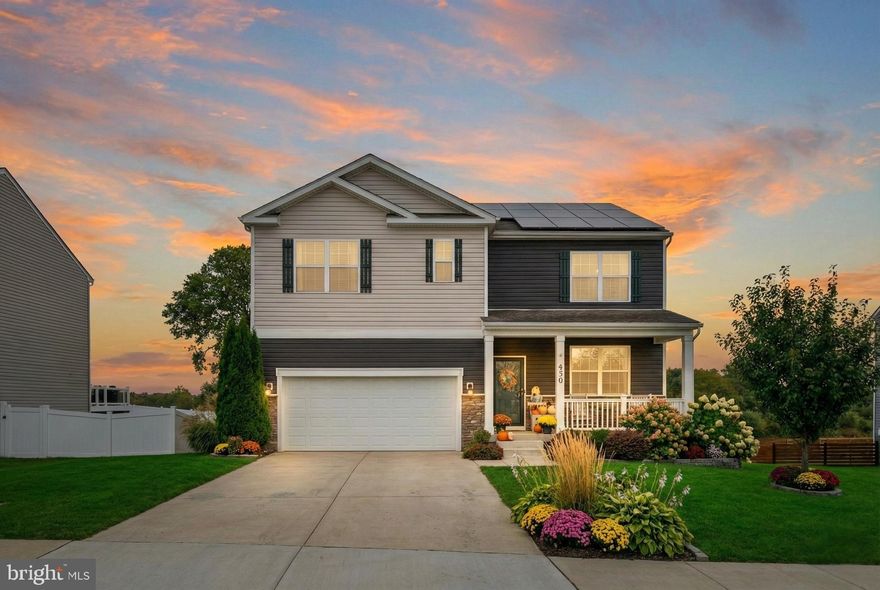 This home is one of those rare ones where you walk in and immediately feel how thoughtfully it’s been done. Built in 2021 and upgraded with over $95,000 in improvements, it’s not just pretty, it’s practical. The kind of place where you’re not budgeting for upgrades or living with a running to-do list. You can move in and just enjoy it.The main level is bright, open, and easy to live in, with LVP flooring throughout most of the space. The dining room offers true flexibility—perfect for a home office or formal entertaining—while the living room feels warm and finished with its shiplap accent wall and electric fireplace. A main-level bedroom and full bath add incredible versatility, ideal for guests, multigenerational living, or anyone wanting a private space without stairs.The kitchen is the heart of the home and it absolutely shows. It’s open, clean, and designed for real life. Stainless steel appliances, classic subway tile, a farmhouse faucet, upgraded lighting, and a Samsung smart refrigerator that makes the everyday stuff feel a little easier. But what really sets it apart is the pantry. This isn’t “extra shelving.” It’s a $10,000 custom pantry built like furniture, with built-ins that keep everything organized, visible, and tucked away in the best way. It’s one of those upgrades that changes your daily routine because the kitchen stays calmer, cleaner, and more functional without you trying. Upstairs you’ve got four spacious bedrooms, plus a huge bonus loft that gives you that second living space everyone ends up needing. Movie nights, homework zone, workout space, teenage hangout, cozy reading room… it flexes with your life. The laundry room is also upstairs, and it’s a dedicated room right next to the bedrooms, which is one of those features you appreciate every single week. The 2022 Whirlpool smart washer and dryer are already in place, so that’s another box checked. The primary suite feels like a true retreat. The custom walk-in closet is the kind that makes mornings smoother, and the bathroom feels elevated with the frameless glass shower and dual shower head setup. It’s the kind of shower that actually feels like a reset at the end of the day. The secondary baths have also been tastefully updated, and the upgraded light fixtures throughout the home tie everything together so nothing feels builder-basic. Outside, the lifestyle really opens up. The expansive Trex deck offers low-maintenance outdoor living, while the fully vinyl-fenced backyard is set up for real life—kids, pets, and entertaining. Enjoy a poured concrete patio, a river rock firepit area made for cozy evenings, and a storage shed. With no immediate rear neighbors, the backyard feels surprisingly private. Additional upgrades make everyday living easier and more comfortable. Solar panels activated in 2024 have resulted in approximately 90% savings on the electric bill, keeping costs low and predictable year-round. A whole-house air scrubber works with the HVAC system to help keep indoor air cleaner, and an electric vehicle charger is already in place. And then there’s the basement—an absolute game-changer. The finished area is a huge blank canvas for whatever your life needs most: a rec room, home theater, gym, playroom, game space… you name it. Beyond that, you’ll find two additional unfinished rooms with truly endless possibilities—future bedrooms, hobby rooms, workshop space, or extra storage.  There’s also a full bathroom rough-in already in place, so adding that next level of finished space later is far more straightforward (and far less expensive) than starting from scratch. Located just minutes from Chet Hobert Park and the Clarke County Re Center, you’ll enjoy access to pools, sports fields, tennis courts, trails, playgrounds, and more. Commuters will appreciate easy access to Routes 7, 340, and 17, with Winchester, Purcellville, and Leesburg all within reach.