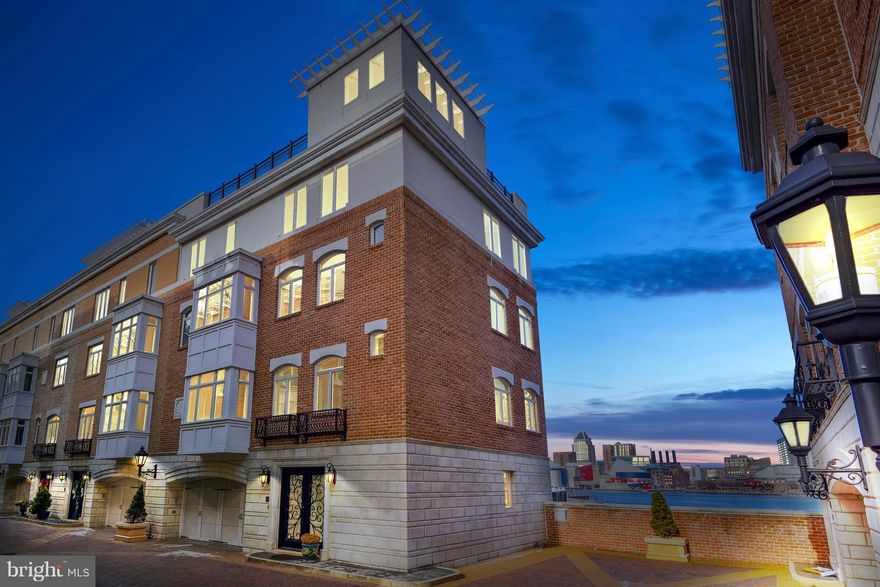 Premier Waterfront property! Harbor View end of row Pier Home ideally situated at the North end of the North Pier, with over 4000 SF of living space. Elevator, 2 car garage, balconies on upper 3 floors, breathtaking views from every room. 4 BR, 3.5 BA, gourmet kitchen, amazing master BR that spans an entire floor w/spa BA, sitting rm, walk-in closet & double-sided fireplace.