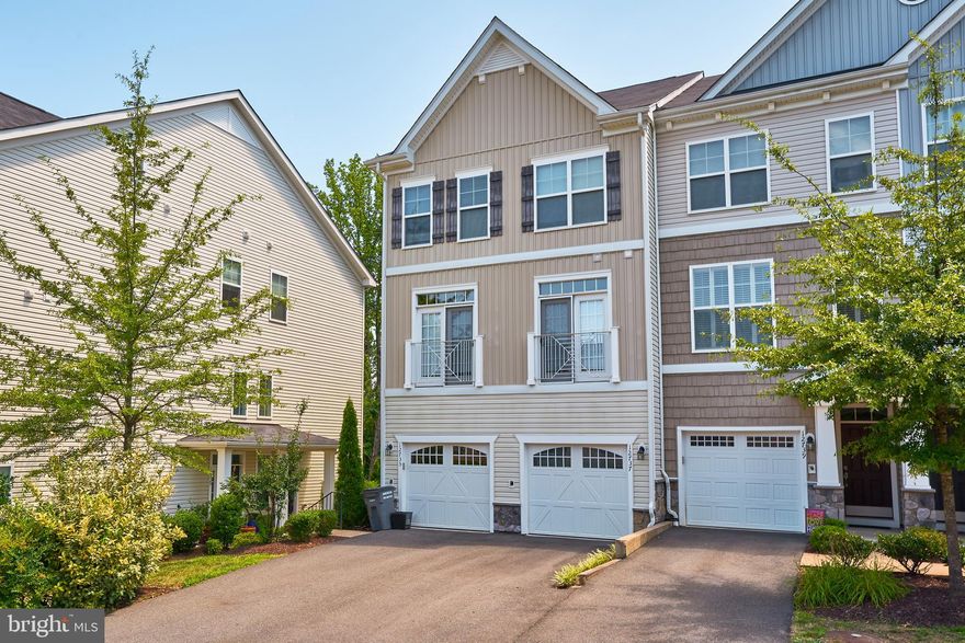 Come home to The Bromley End Unit which includes builder finishes. Gleaming Hardwood floors on Main level welcome you, Kitchen with granite countertops , S/S Appliances that boast entertaining with open floor plan. Enjoy the seasons with a convenient Deck Off Rear, 3 Finished Levels layed out perfectly and well maintained built in 2017 this home is move in ready.  2nd floor primary and Full Bath, and 3rd floor with 2 Separate Bedrooms and Full Bath, 1- car garage and plenty of ample parking for (2)guests including parking area. Location, Location!-Minutes to I-95, Rt 123, VRE and Commuter Lots, Short Walk to Occoquan Shops and Restaurants,